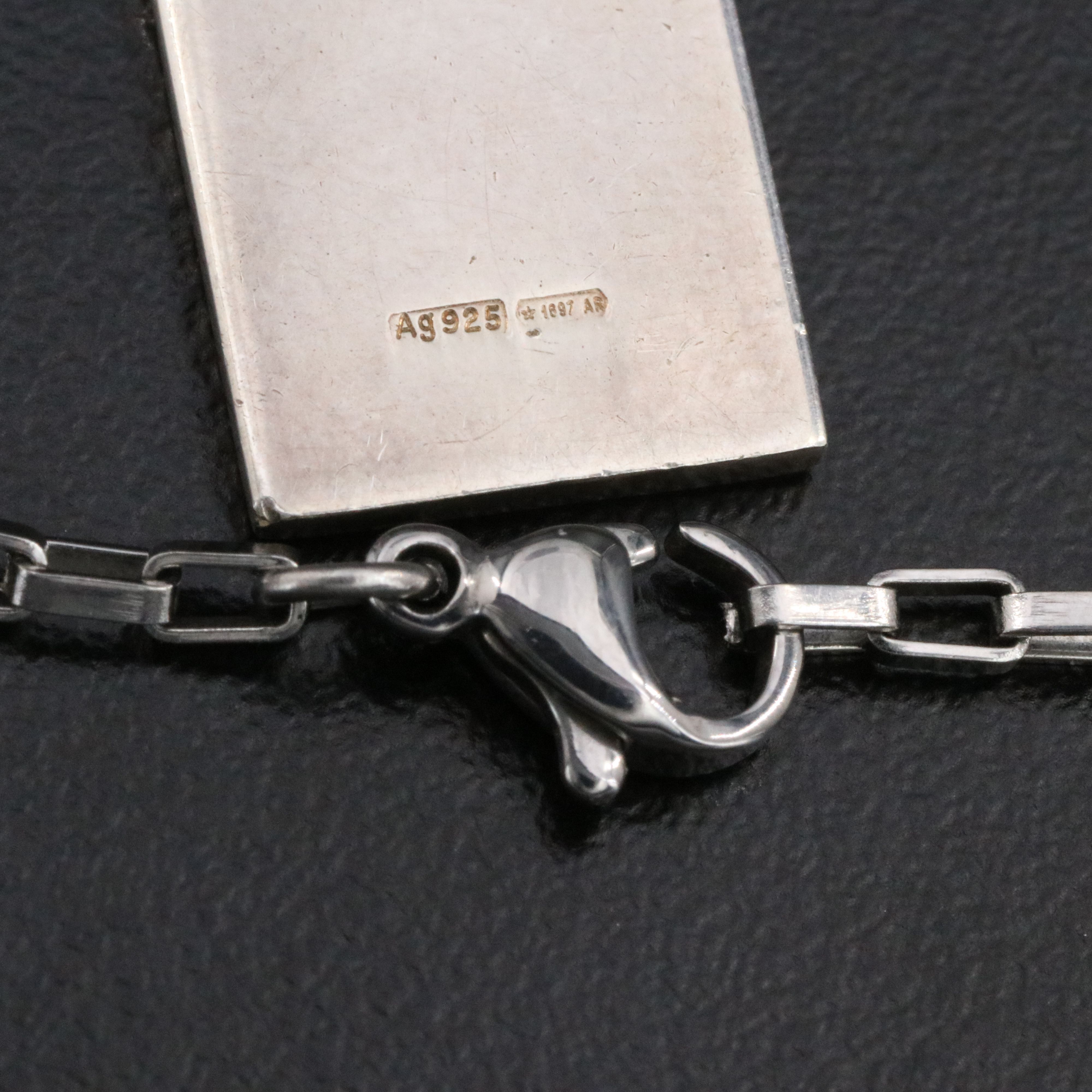 Gucci Sterling G Logo Pendant with a Stainless Steel Chain