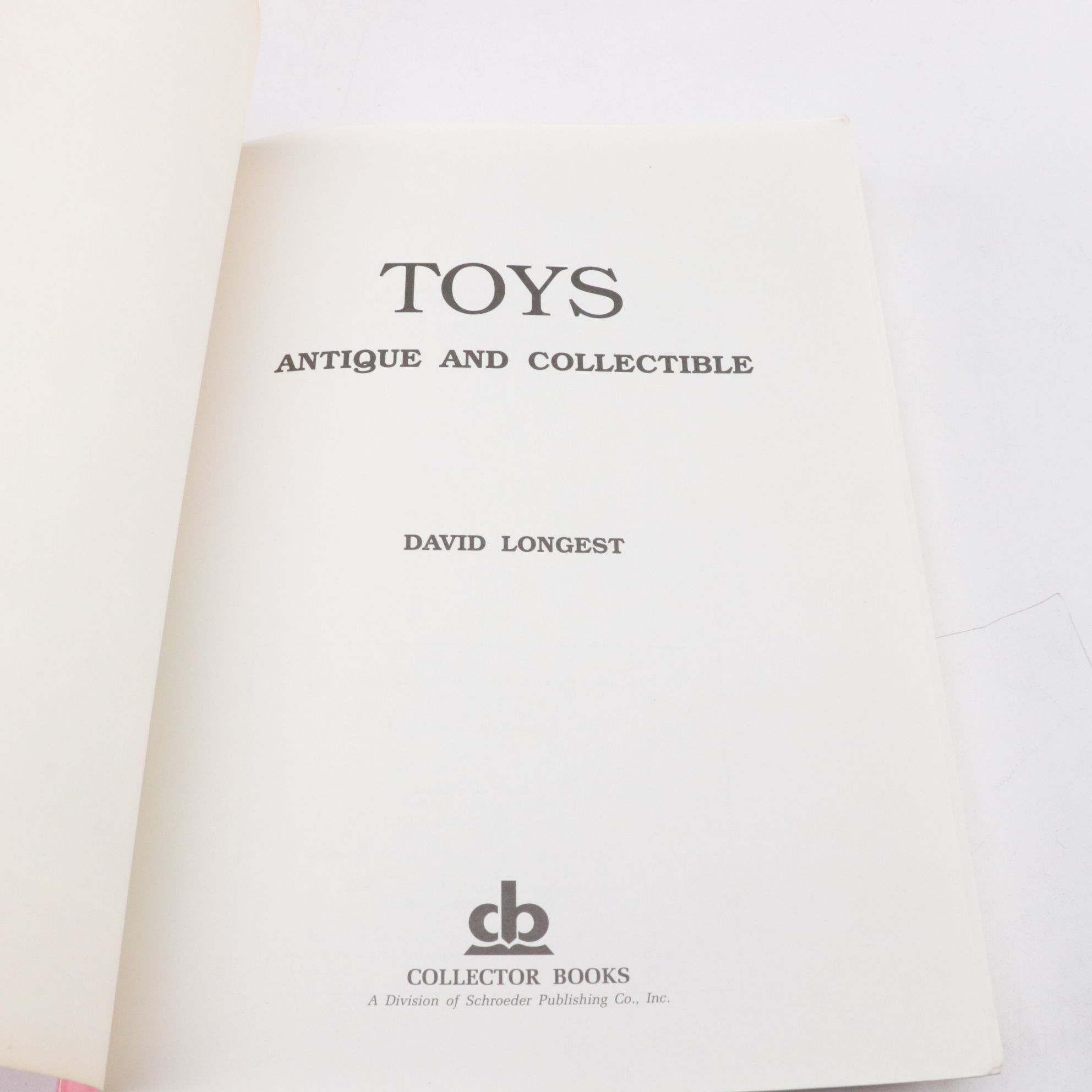 Assortment of Collector's Guide Books on Toys, Kitchenwares, and Open Salts