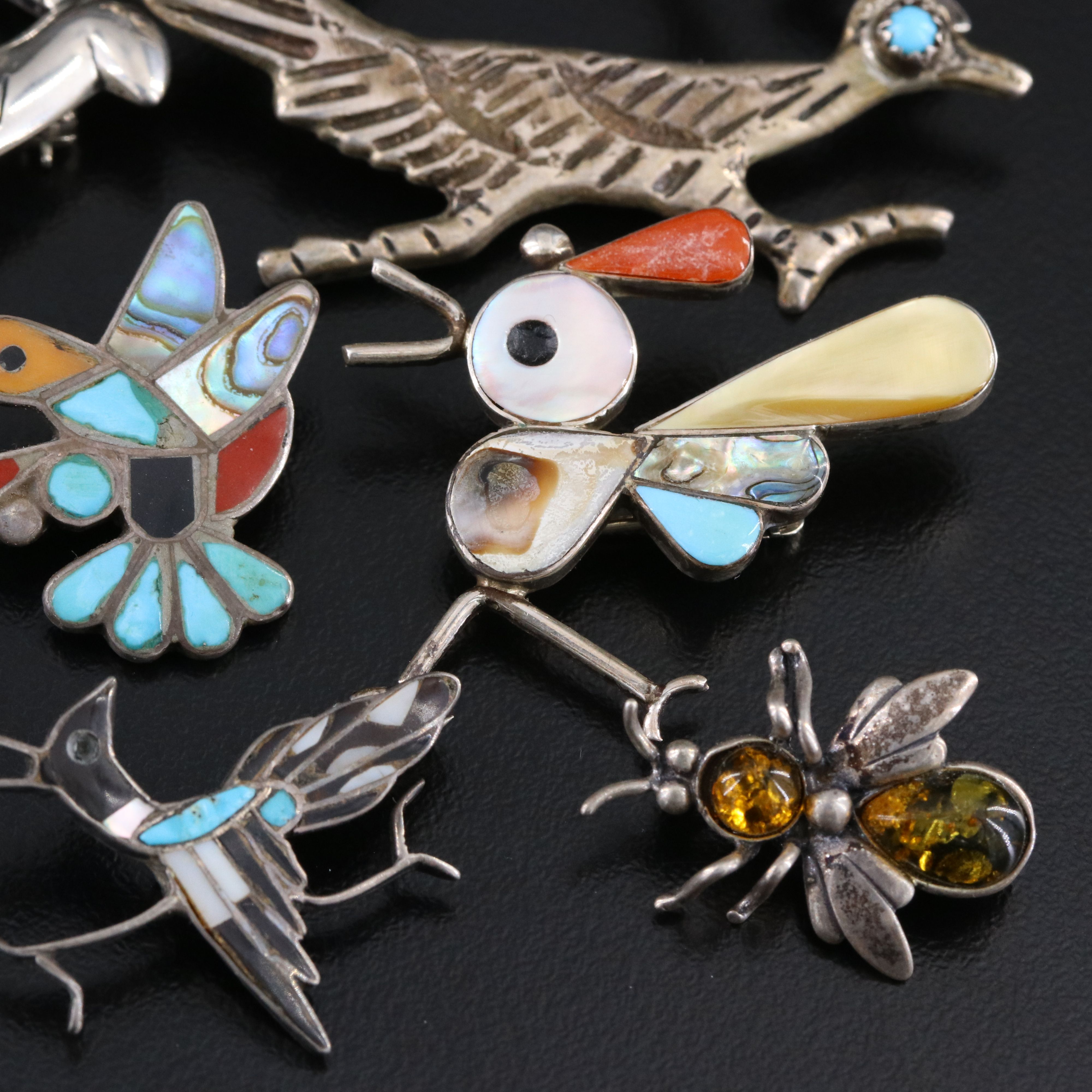 Southwestern Sterling Brooches & Pins Including Relios, Coral, and Amber