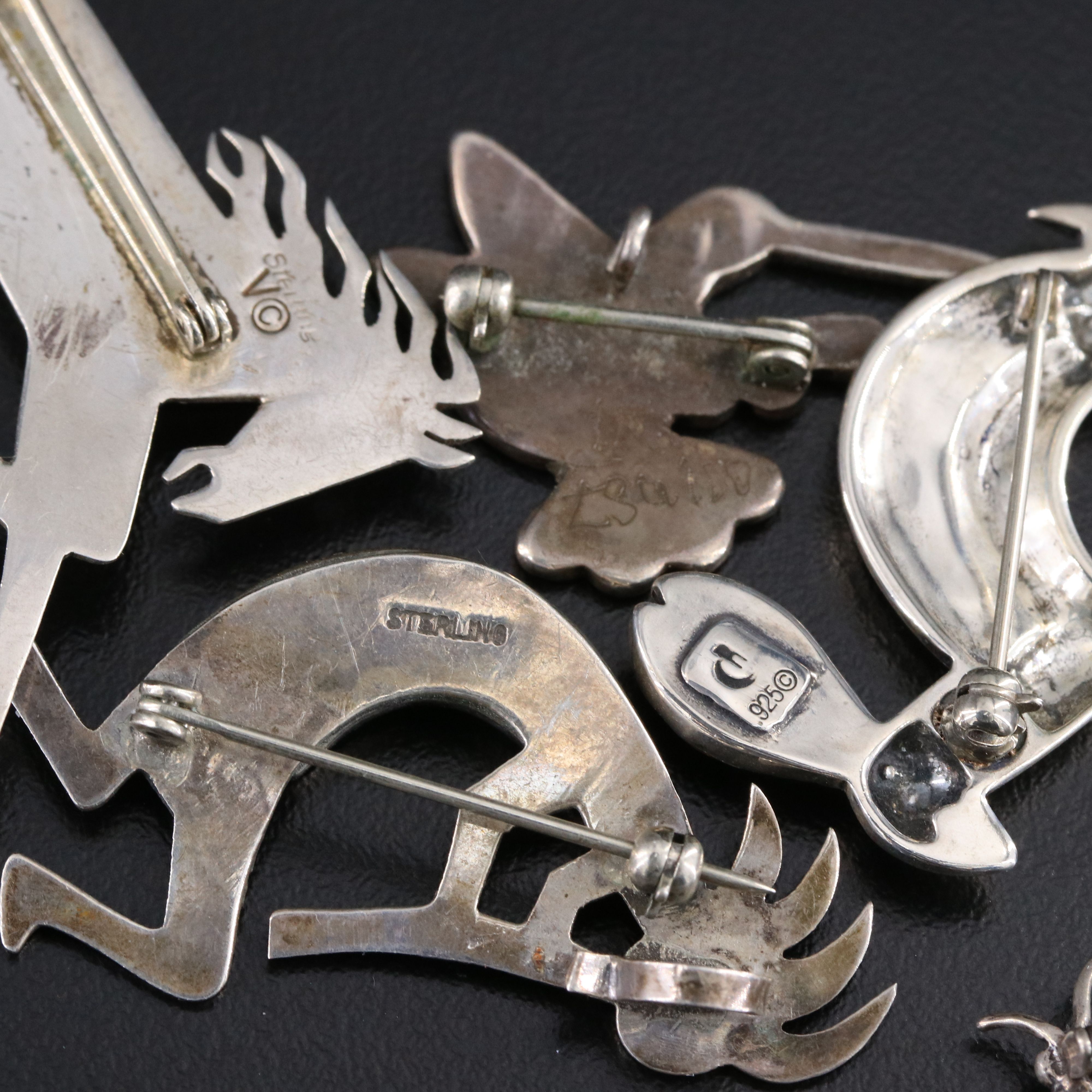 Southwestern Sterling Brooches & Pins Including Relios, Coral, and Amber