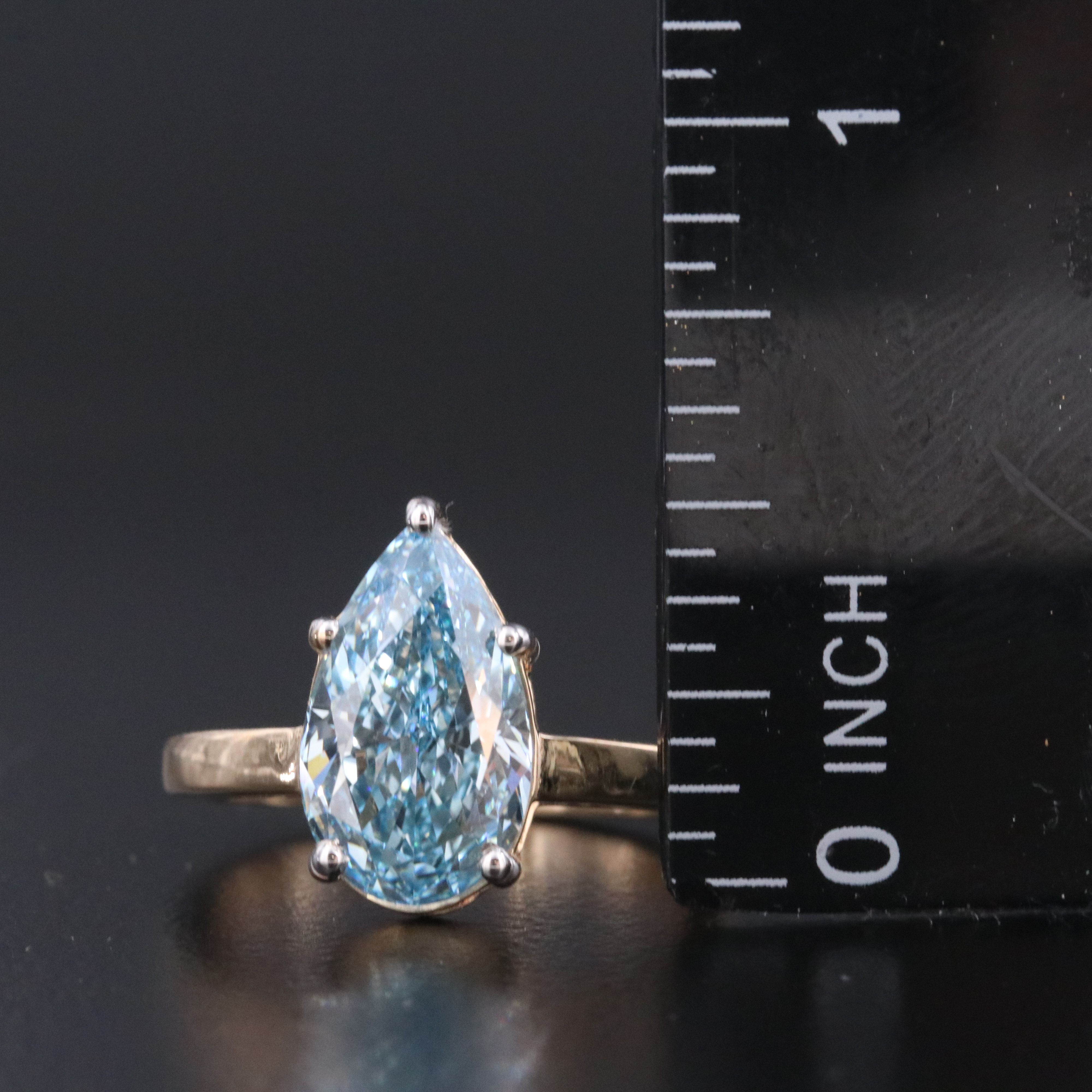 18K 3.17 CTW Lab Grown Fancy Vivid Blue Diamond Ring with IGI Report
