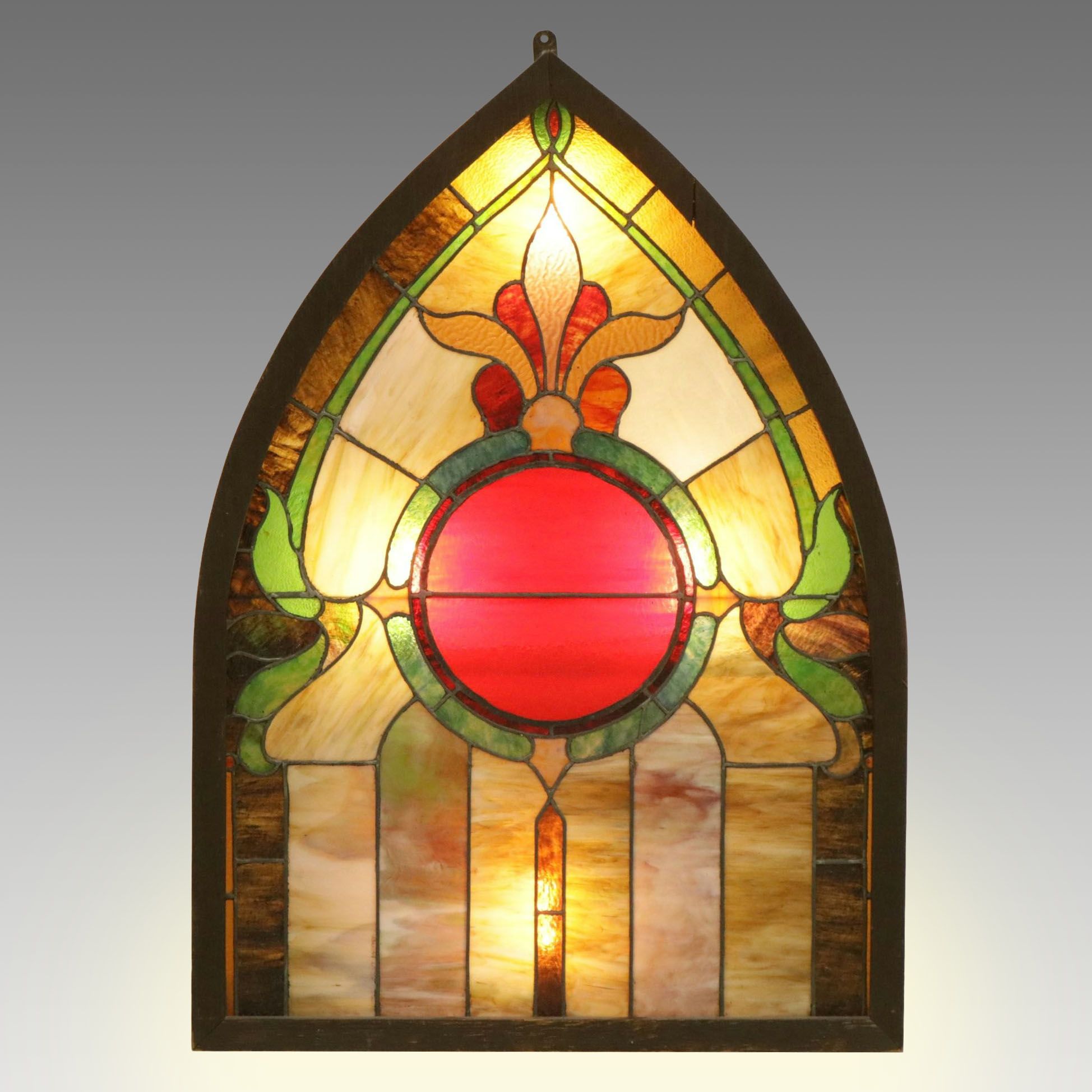 Gothic Arch Stained Glass Window in a Back-Lighted Frame