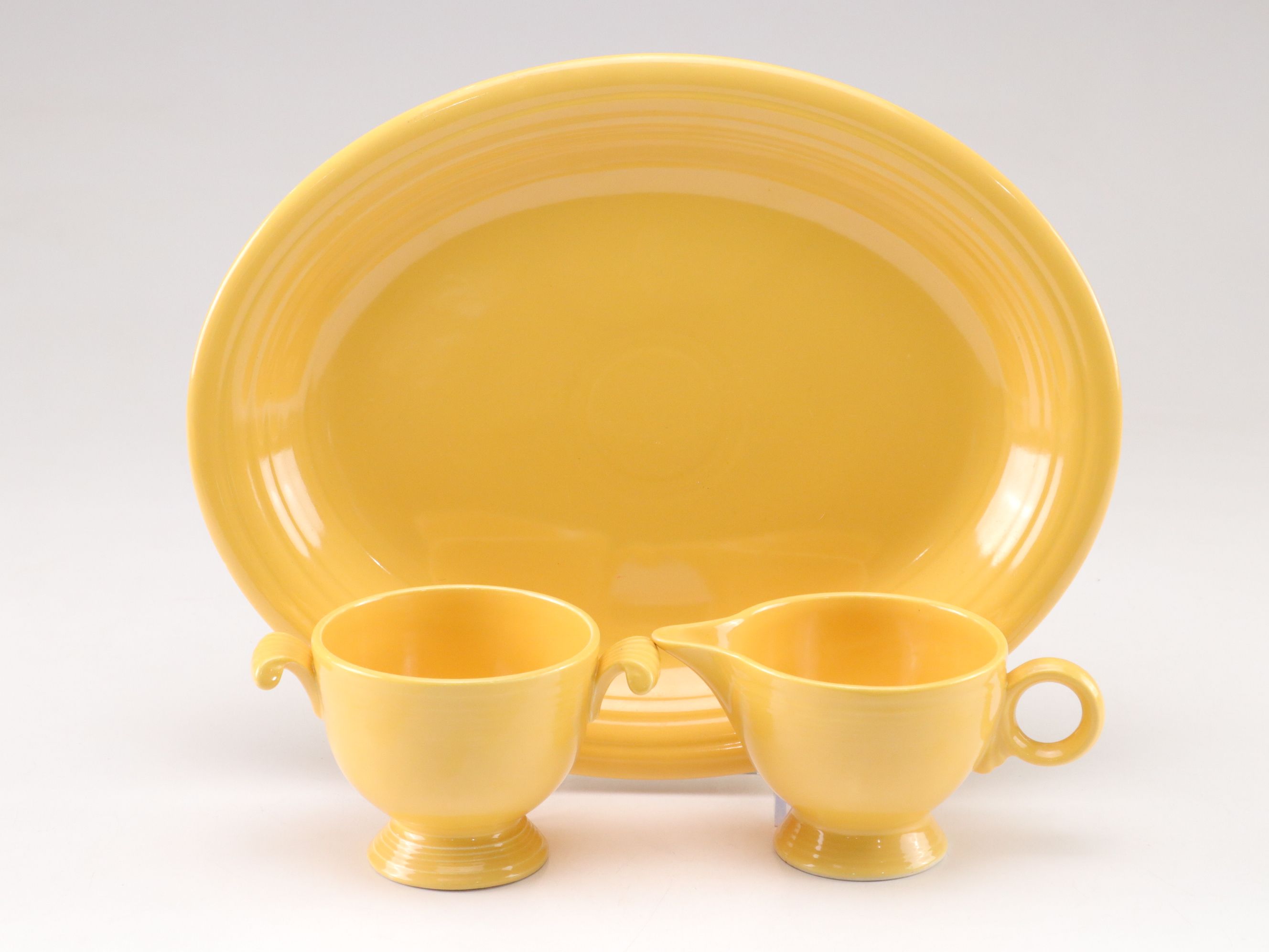 Homer Laughlin Co. "Fiesta" Yellow Dinnerware and More, Mid-20th C.