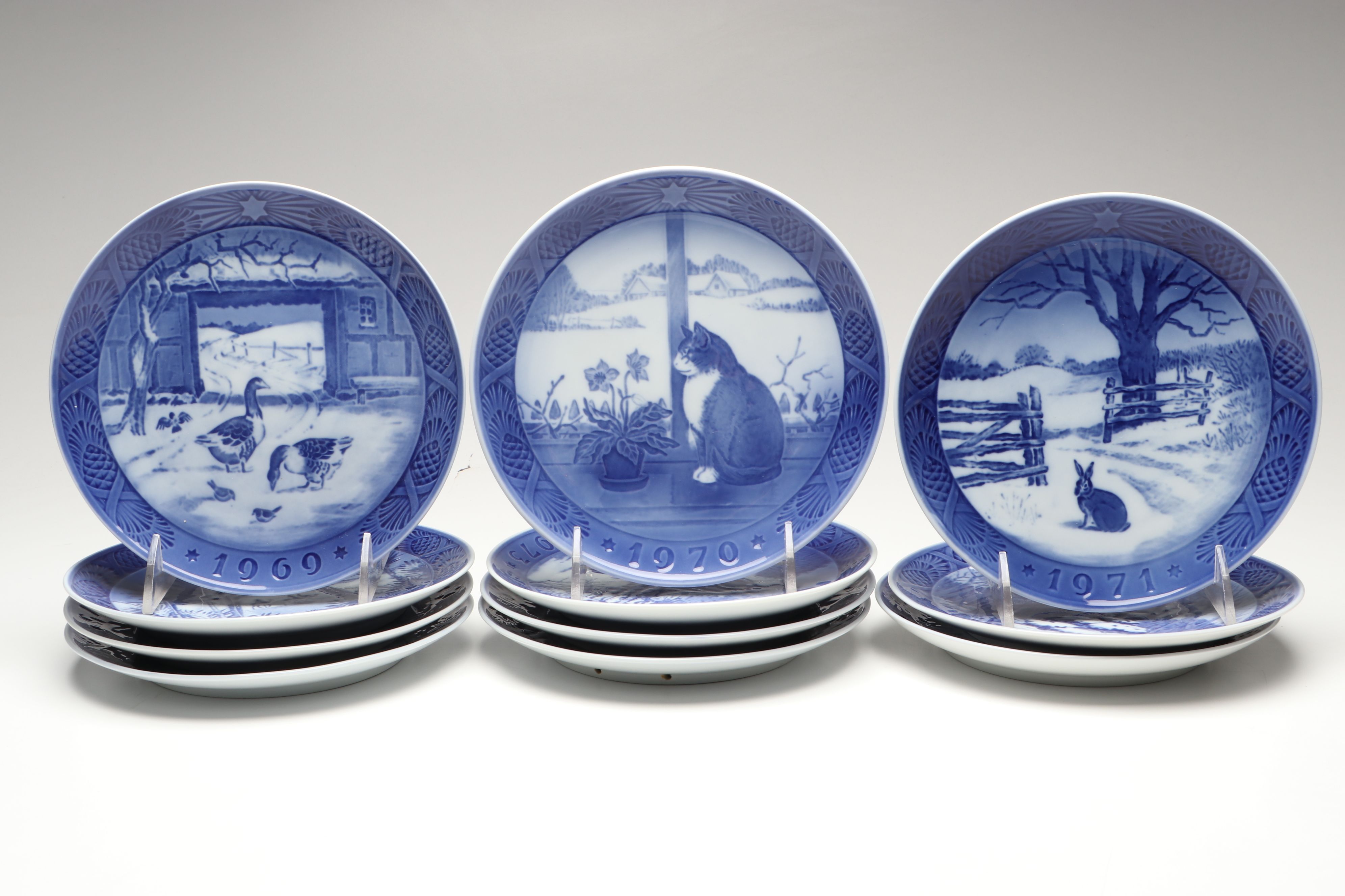 Royal Copenhagen Porcelain Collector Plates Featuring "In The Old Farmyard"