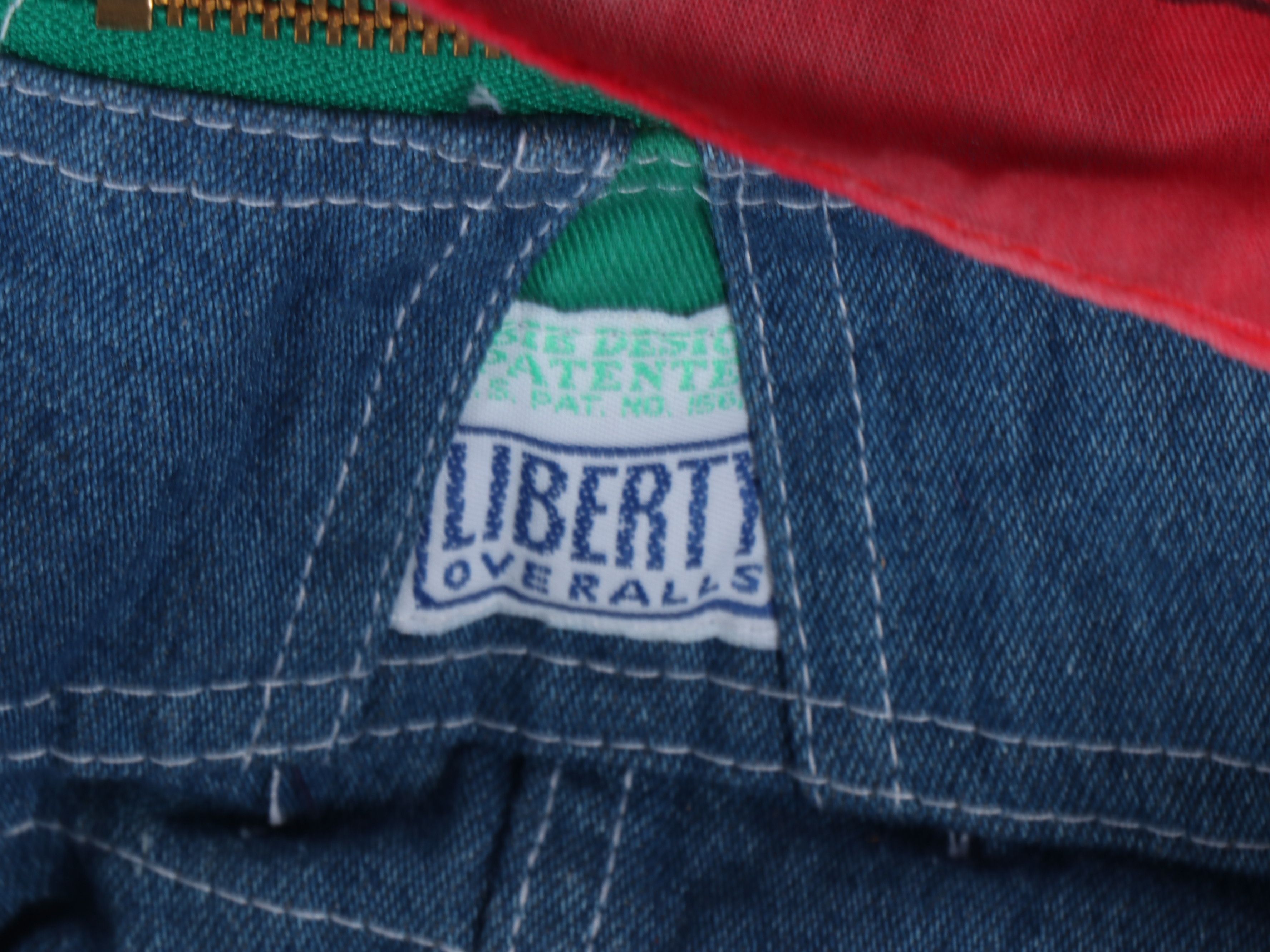 Handcrafted Wooden Sitting Dog Figurine with Liberty Denim Overalls