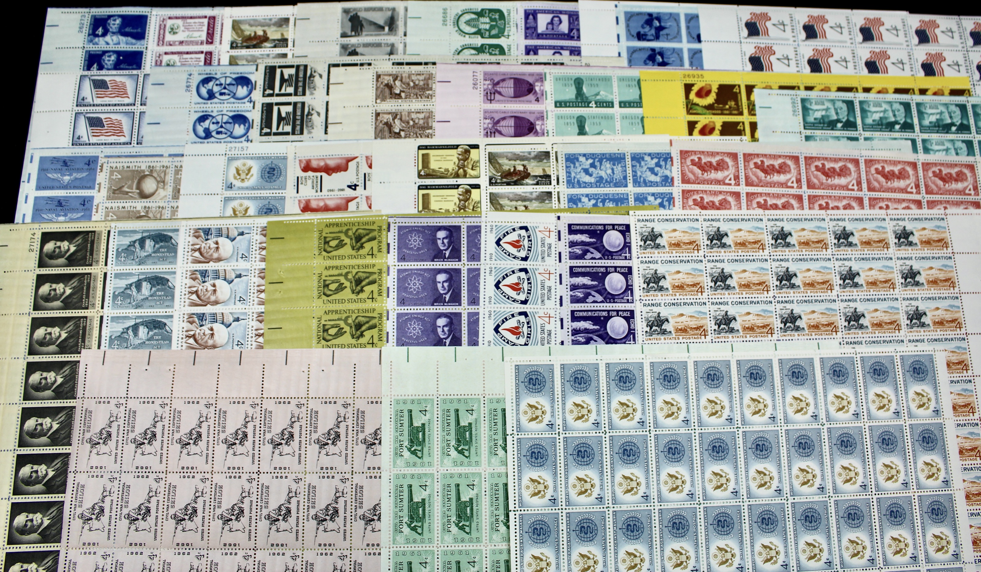 100 Mint Condition U.S. Postage Stamp Sheets, 1940s-1960s