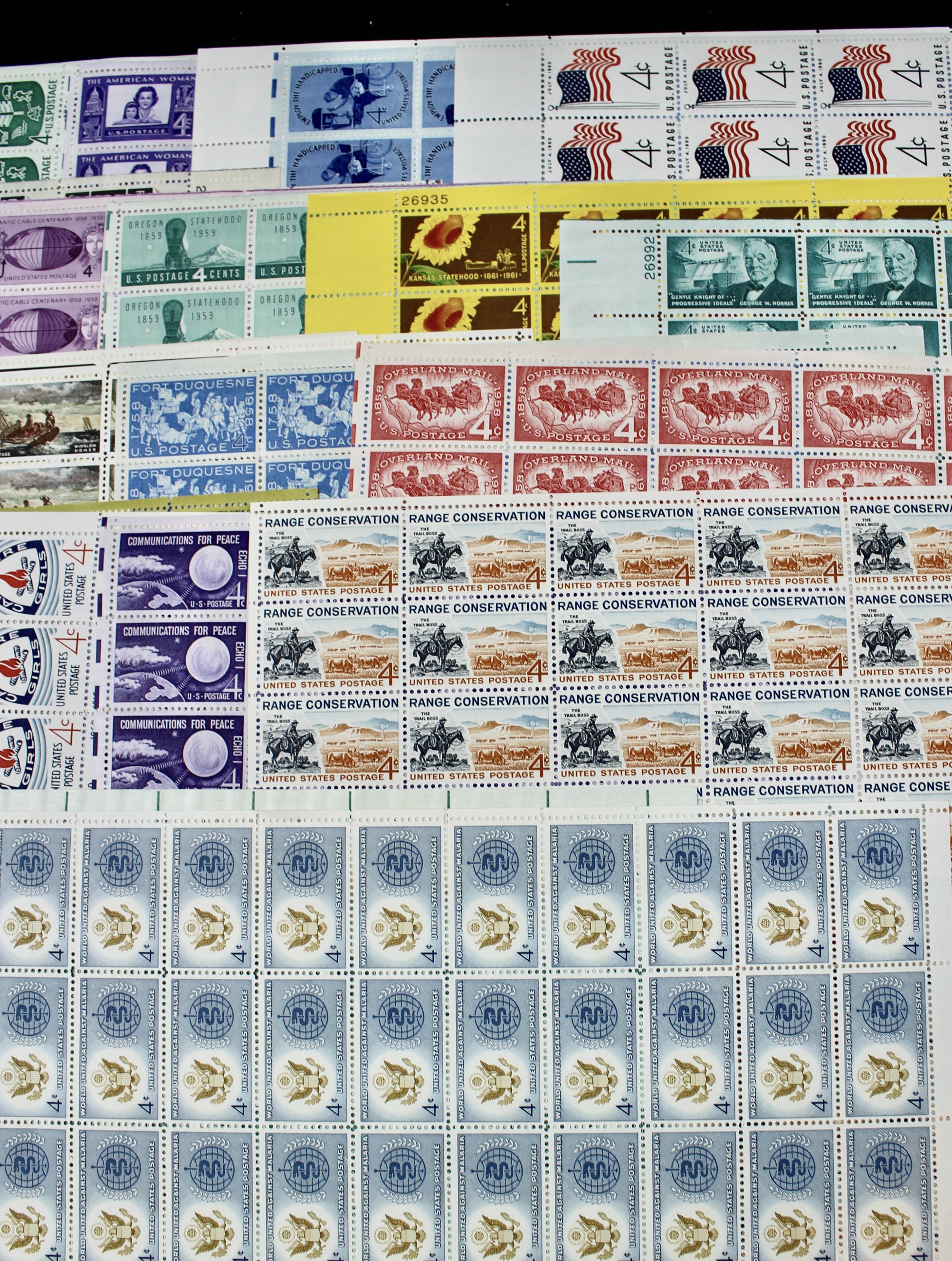 100 Mint Condition U.S. Postage Stamp Sheets, 1940s-1960s
