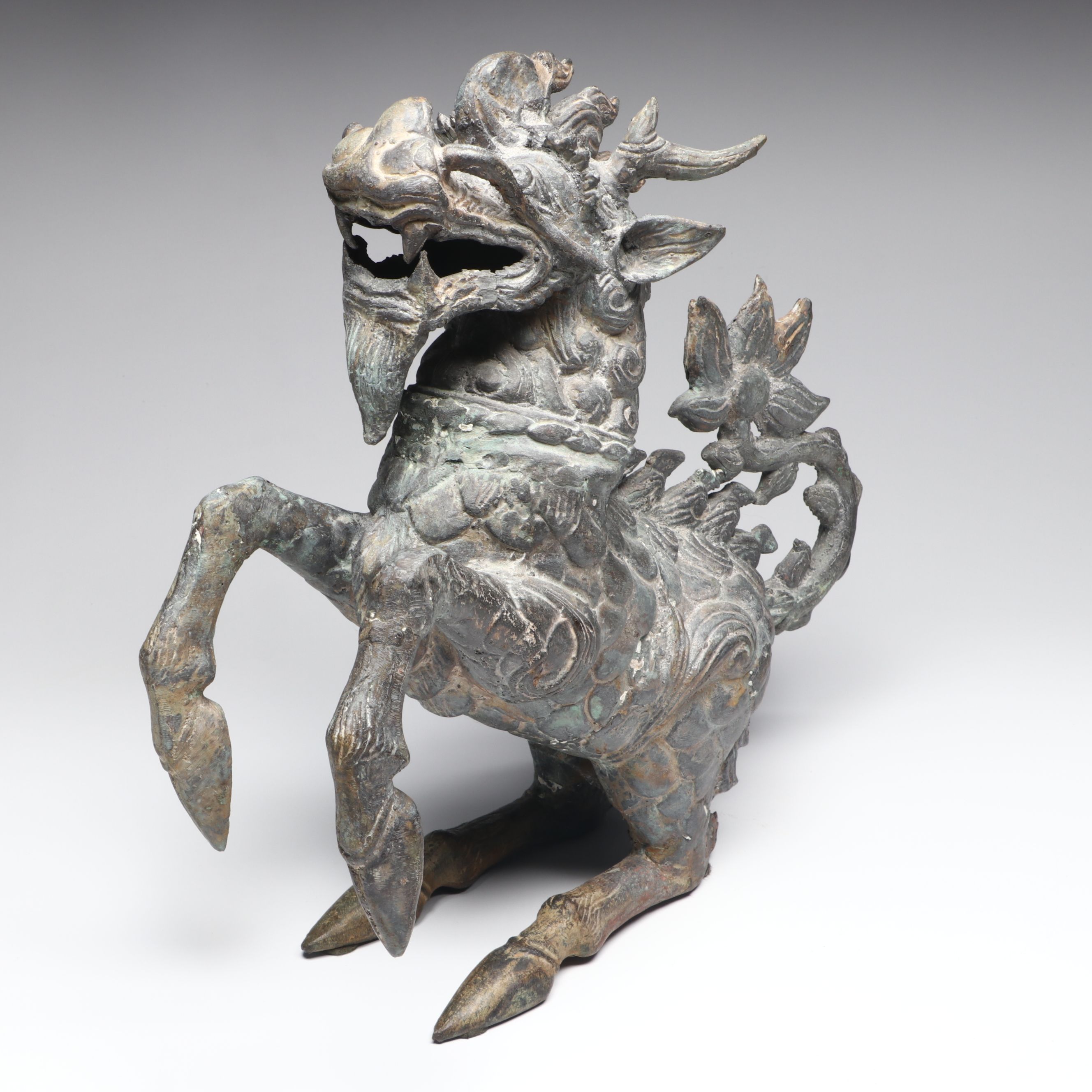 Patinated Qilin Metal Figurine Pair