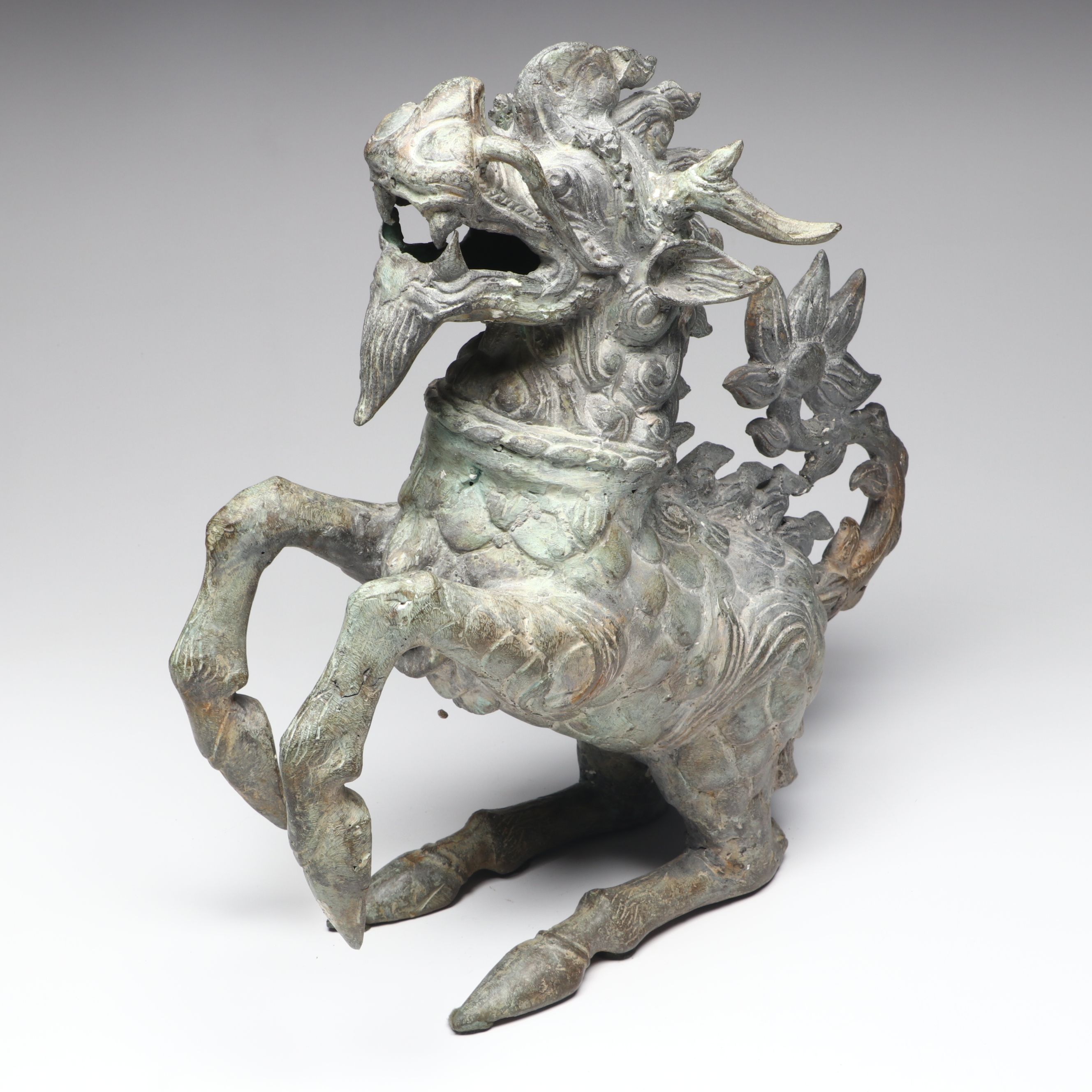 Patinated Qilin Metal Figurine Pair