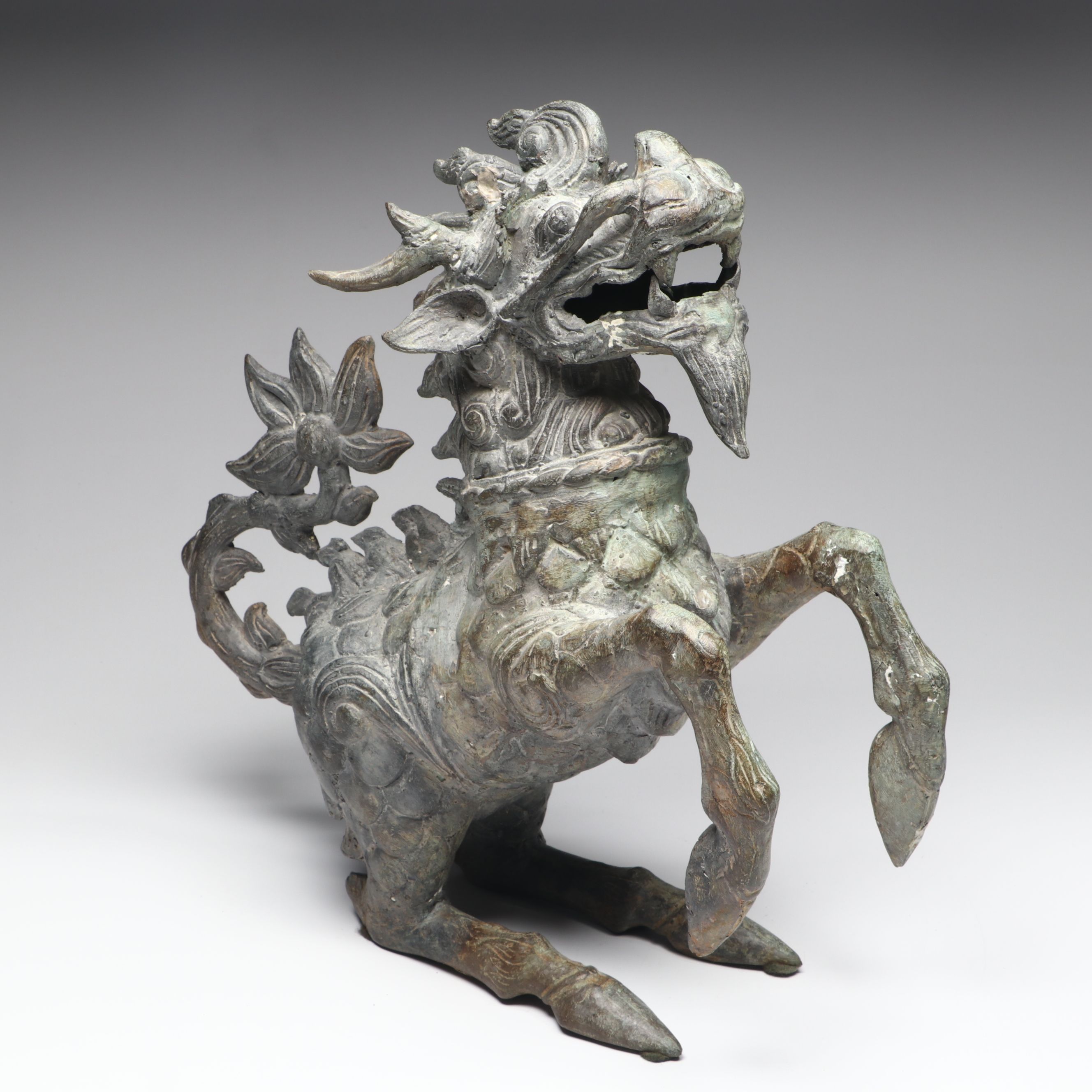 Patinated Qilin Metal Figurine Pair