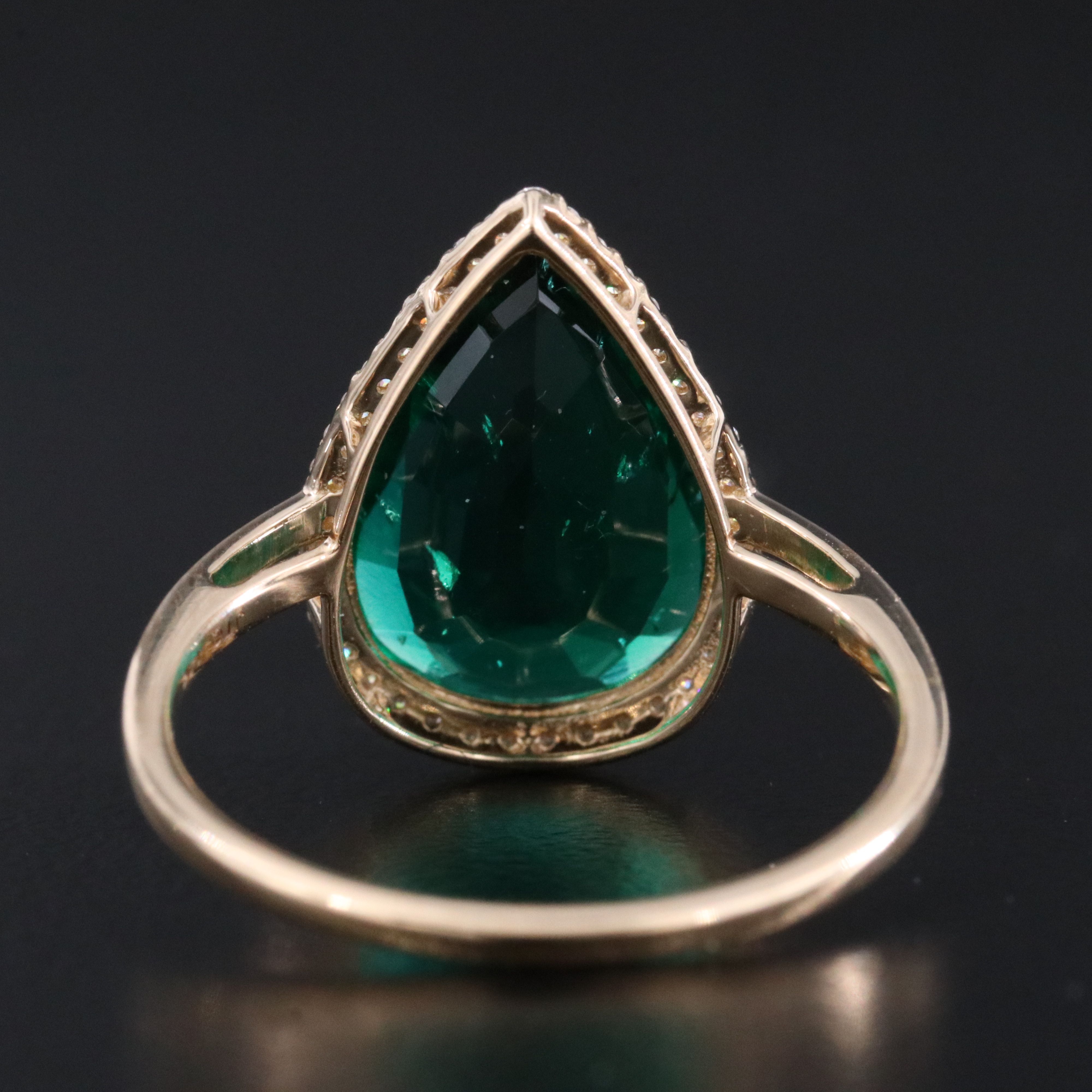 14K 3.27 CT Emerald and Moissanite Ring