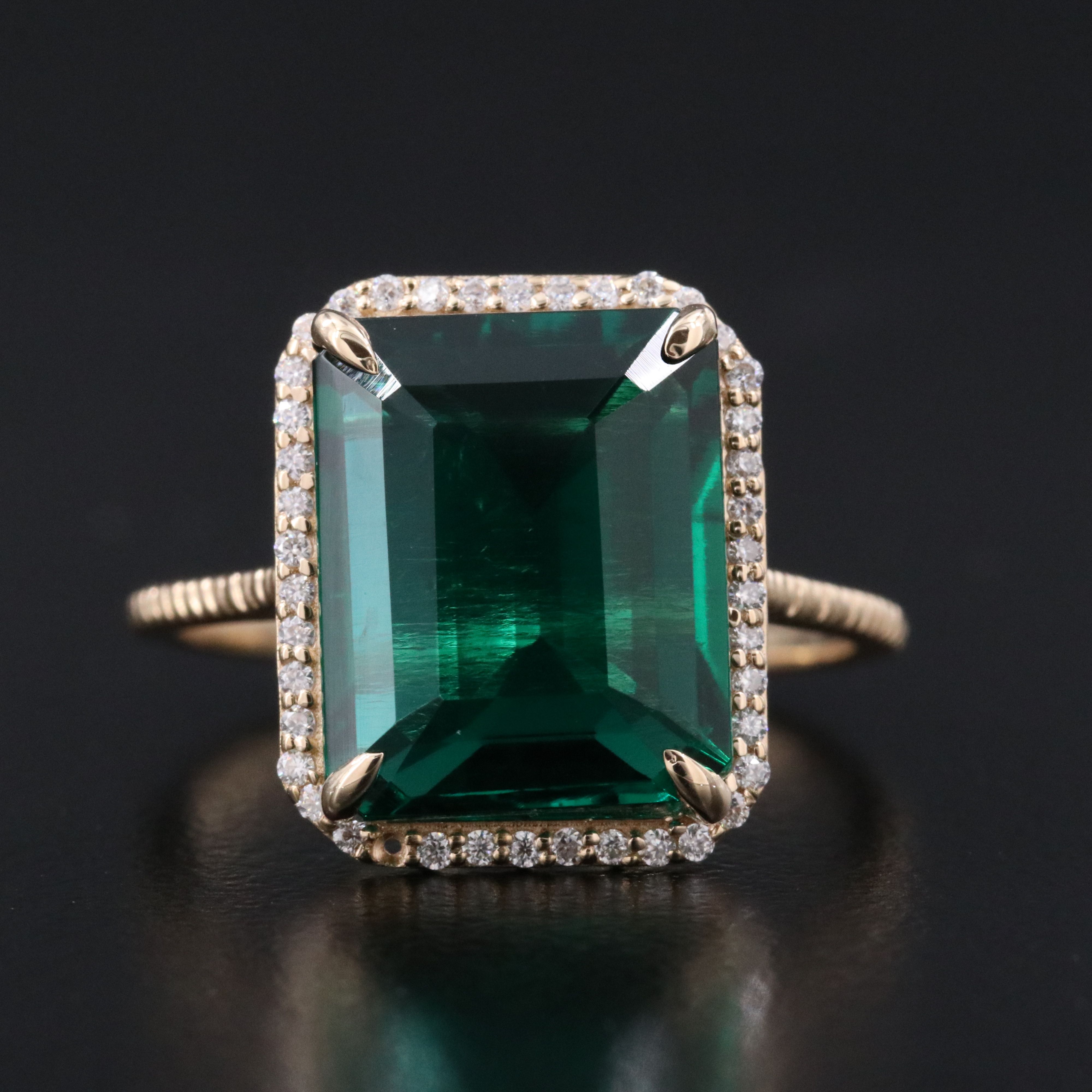 14K 4.53 CT Emerald and Moissanite Ring