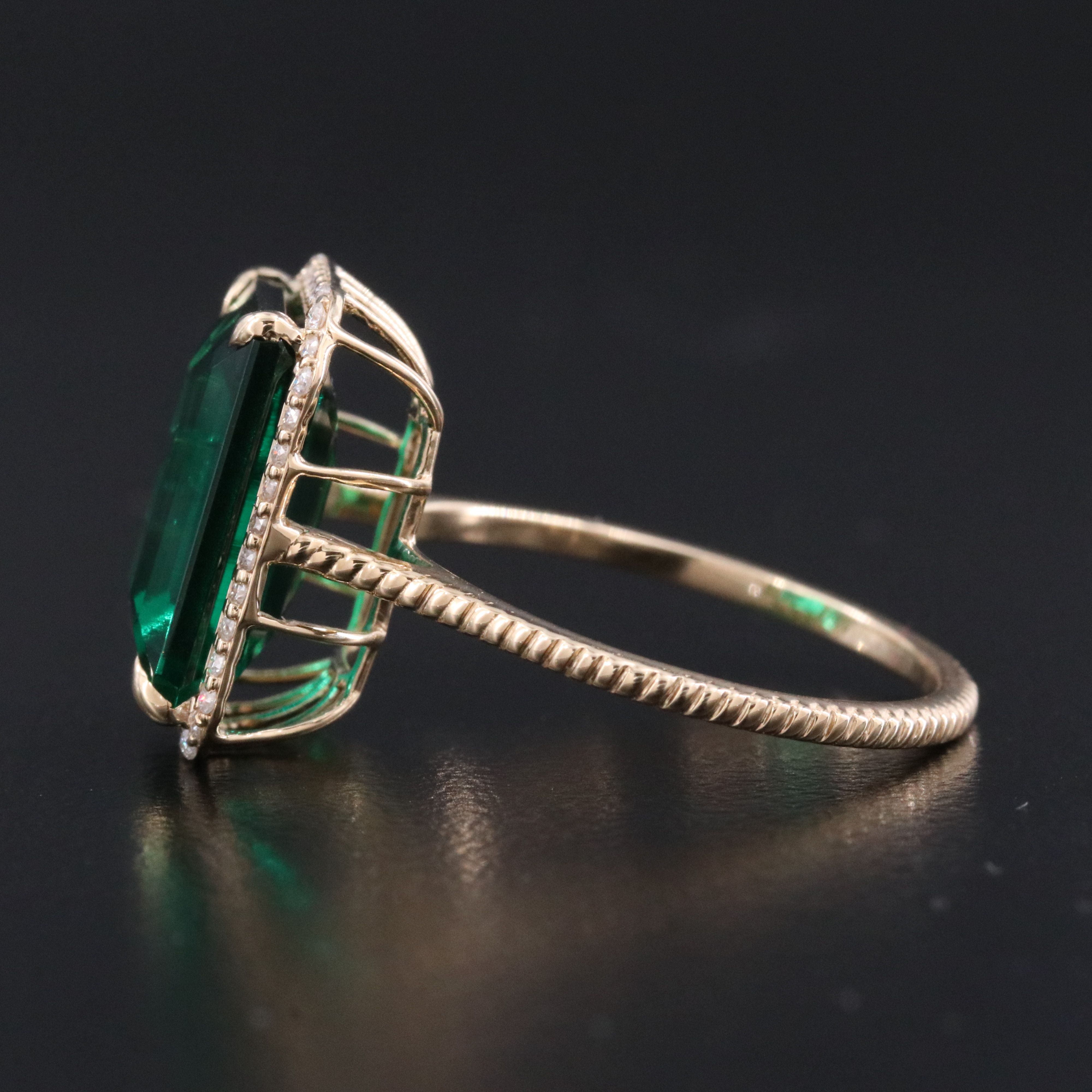 14K 4.53 CT Emerald and Moissanite Ring