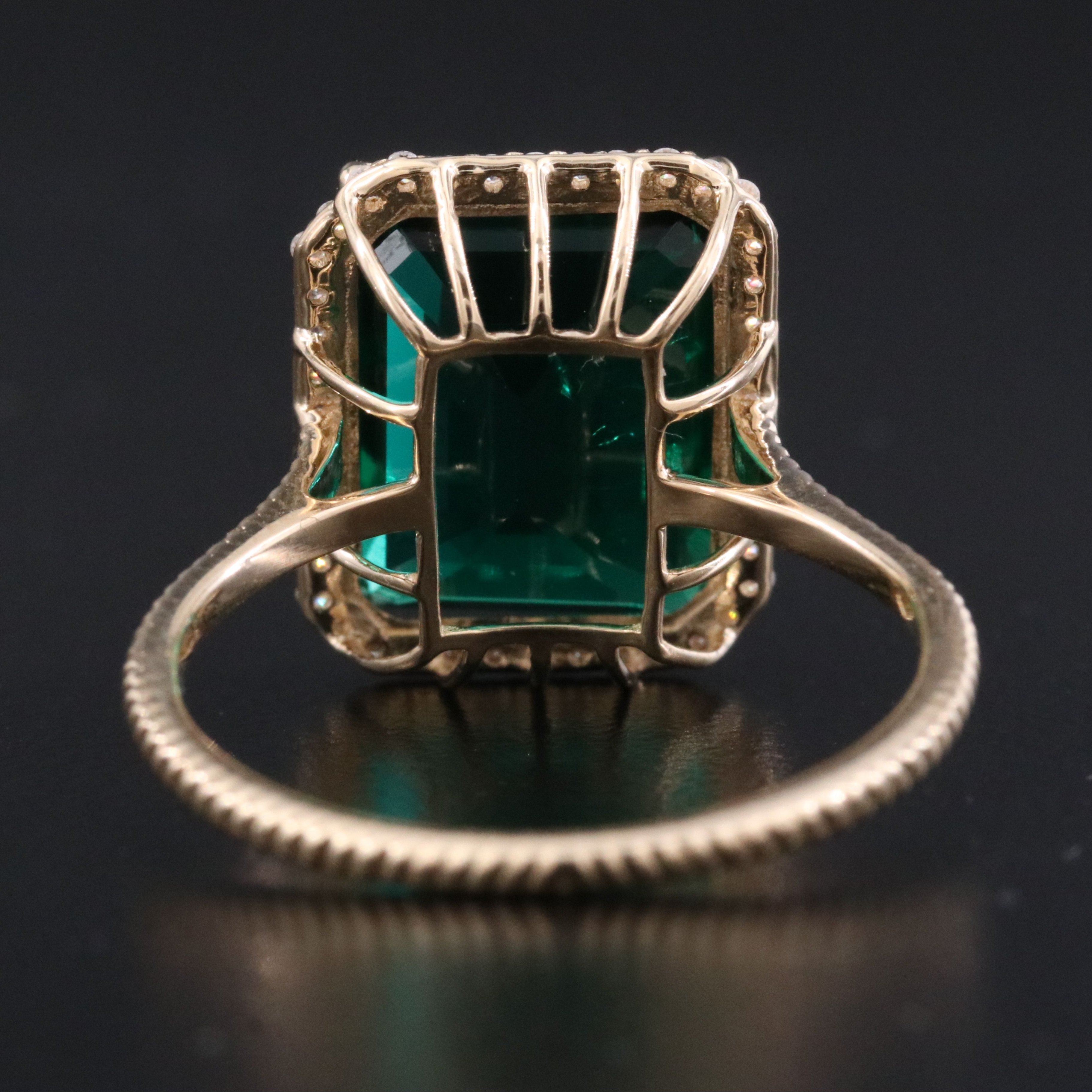 14K 4.53 CT Emerald and Moissanite Ring