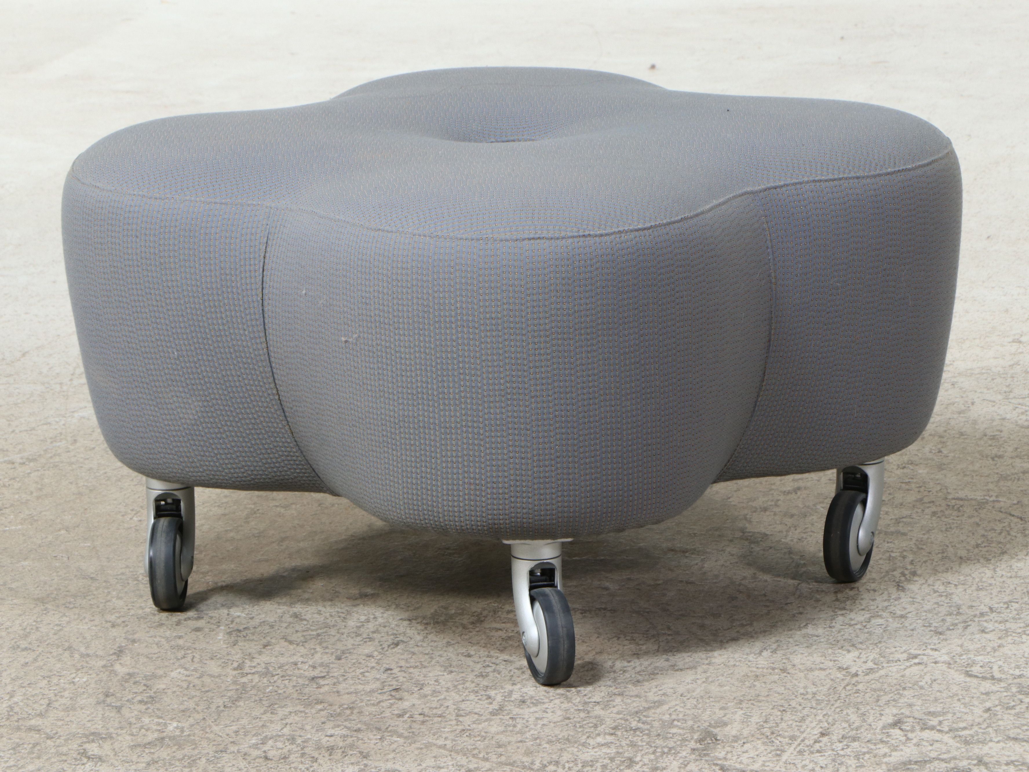 Contemporary Upholstered Quatrefoil- or Clover-Shaped Rolling Ottoman