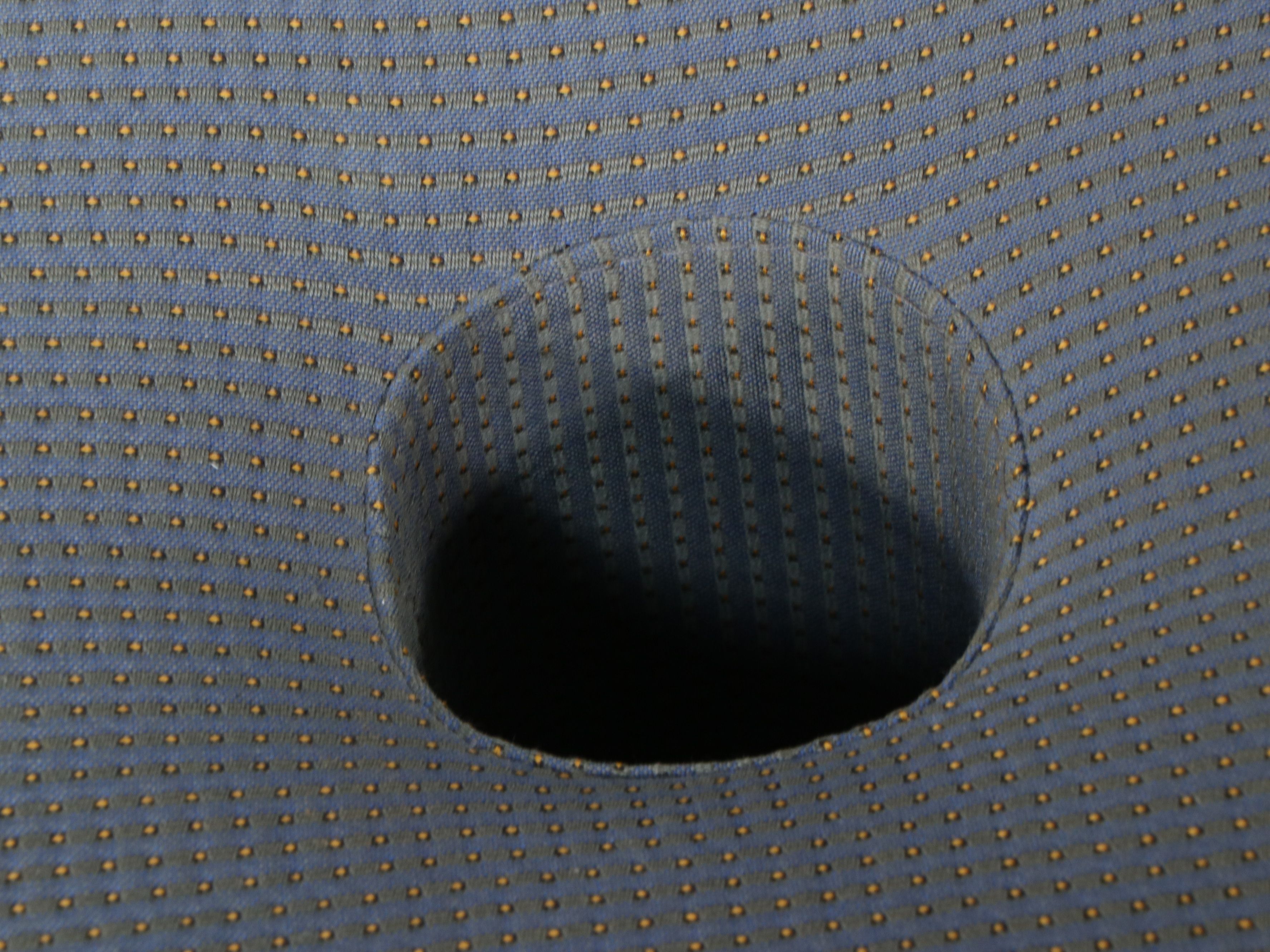 Contemporary Upholstered Quatrefoil- or Clover-Shaped Rolling Ottoman