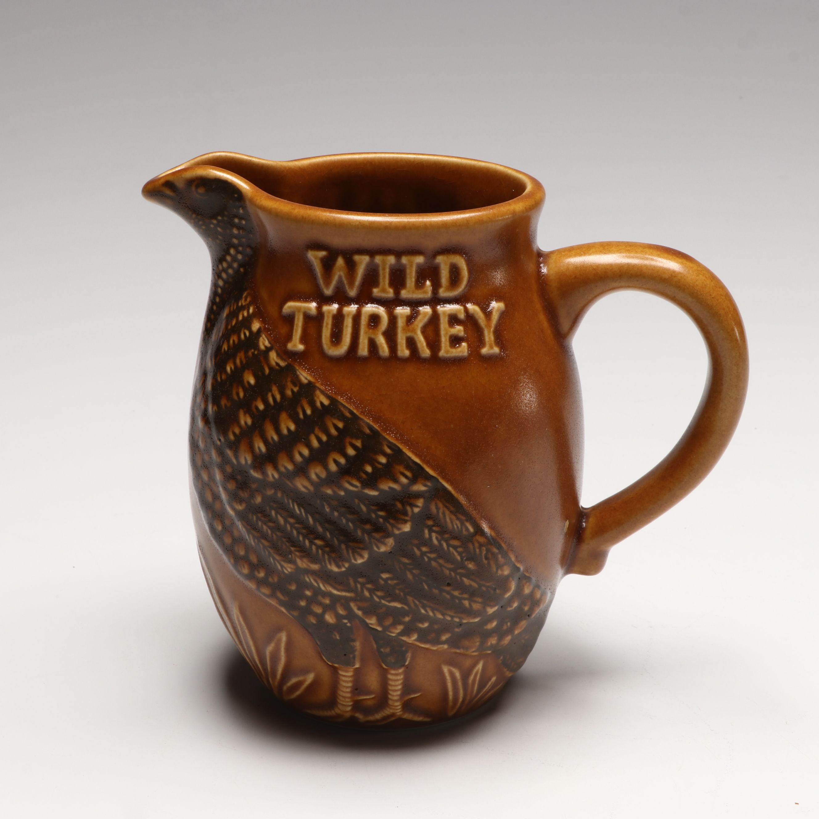 Austin Nichols Wild Turkey Ceramic Pitcher with Sterling and Metal Jiggers