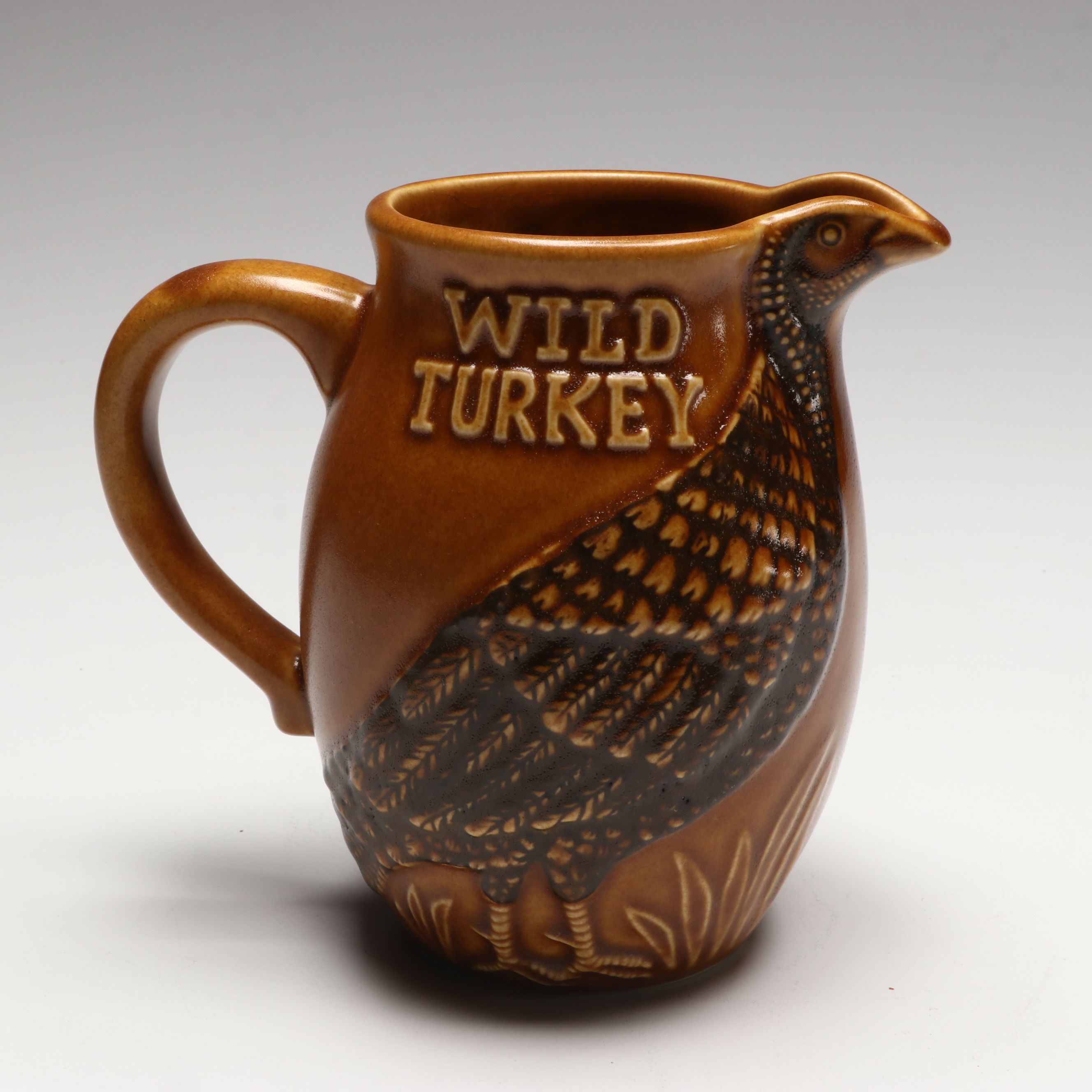 Austin Nichols Wild Turkey Ceramic Pitcher with Sterling and Metal Jiggers