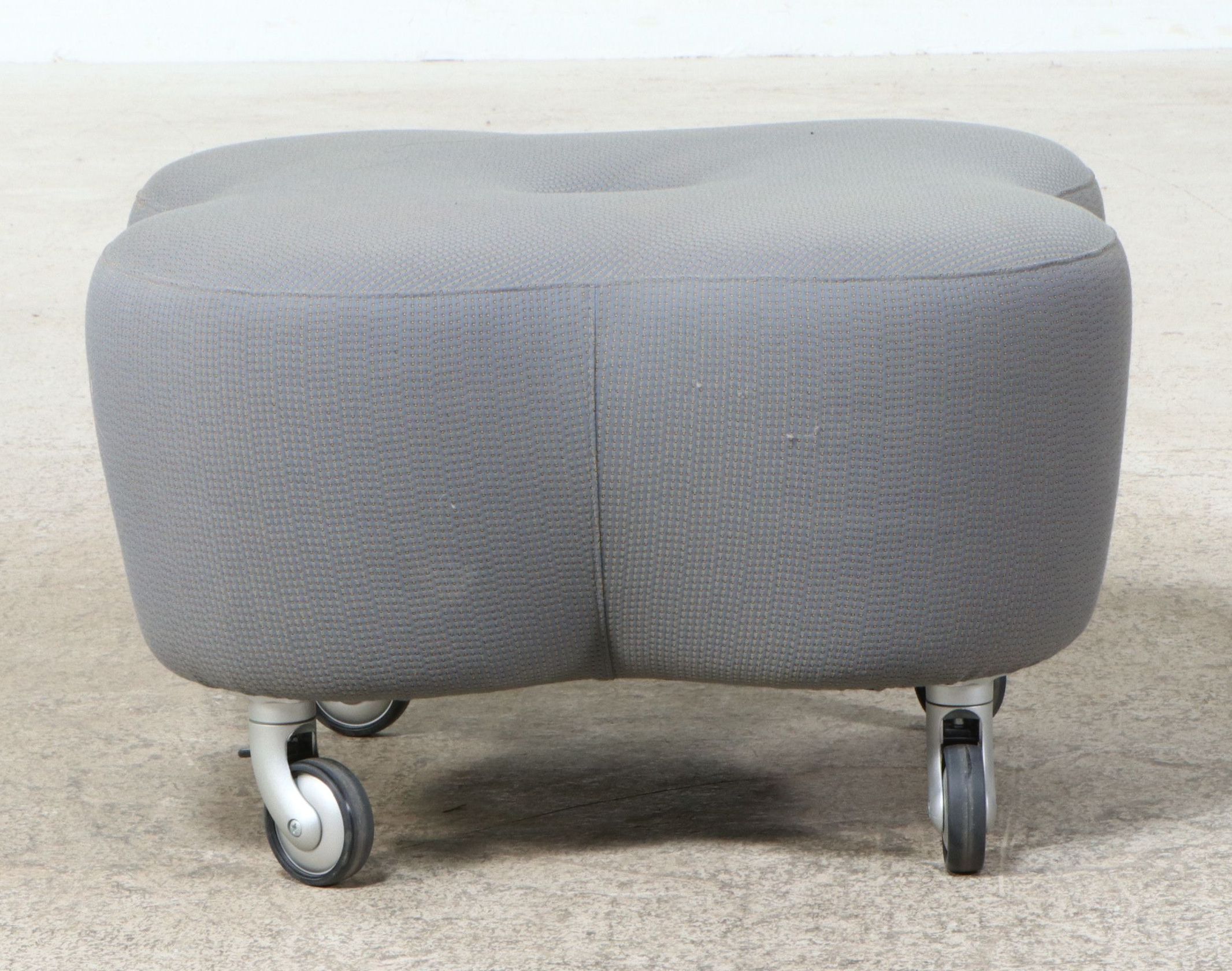 Contemporary Upholstered Quatrefoil- or Clover-Shaped Rolling Ottoman