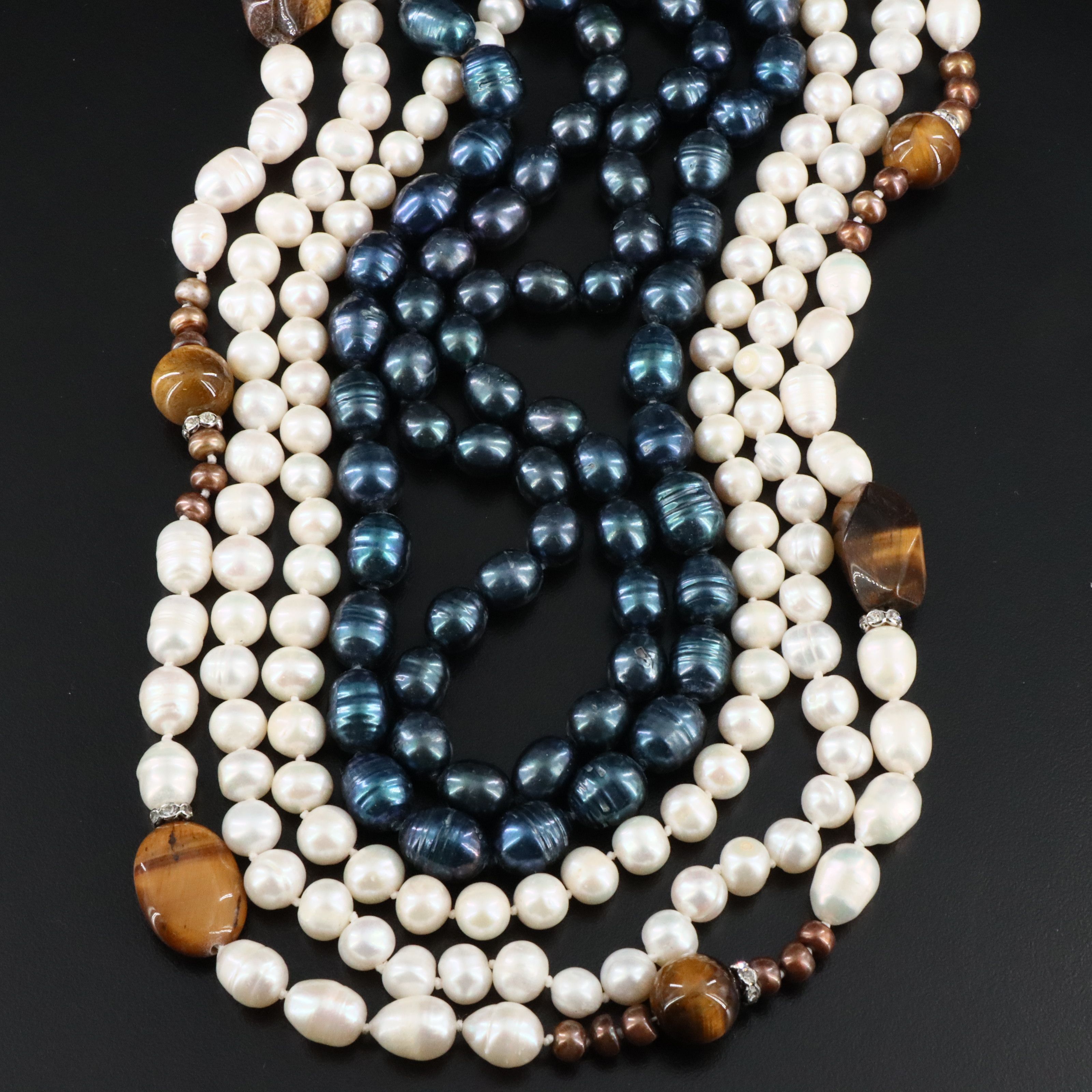 Pearl, Tiger's Eye, and Rhinestone Featured in Jewelry Collection