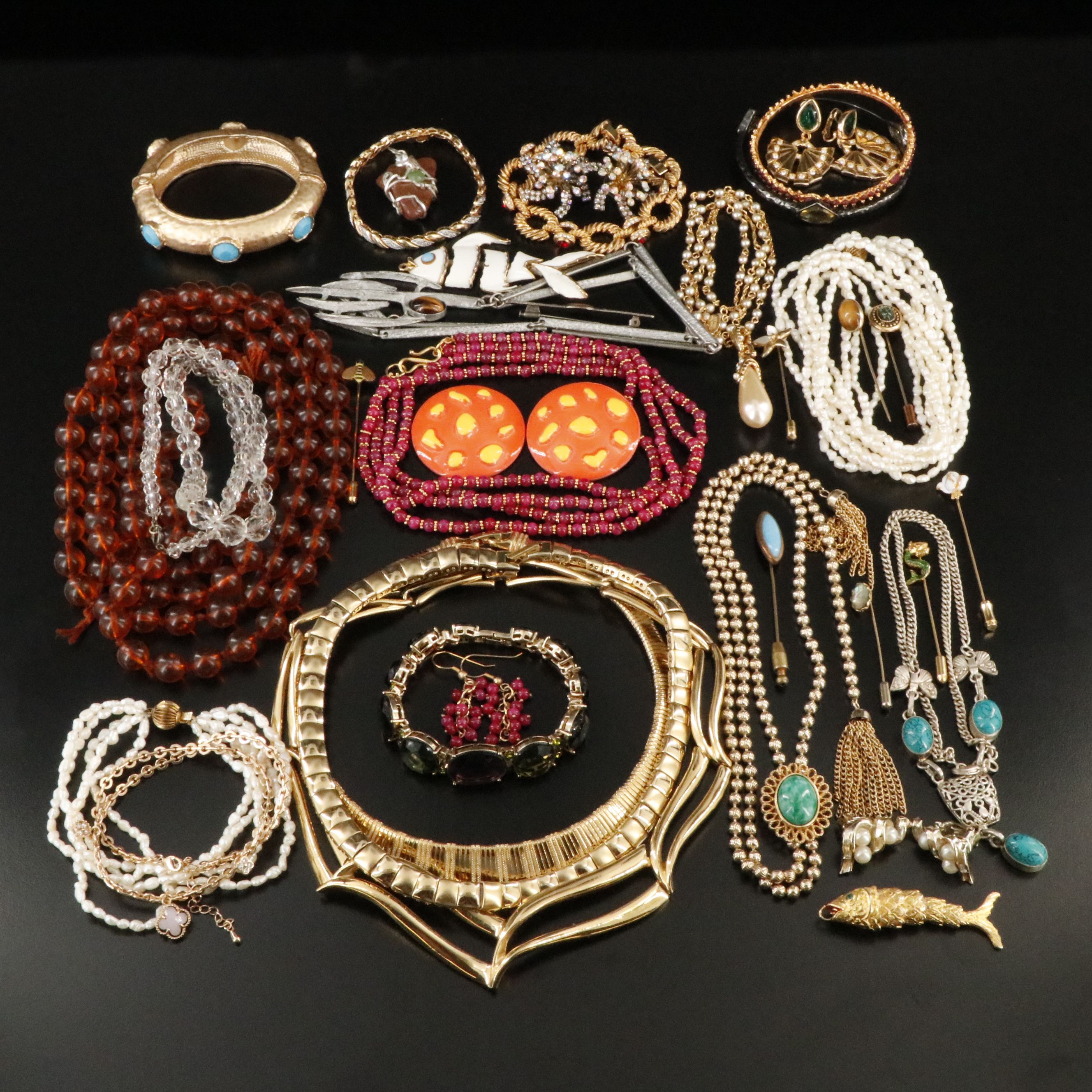 Emmons, Articulated Fish Pendants and Tiger's Eye Featured in Jewelry Assortment