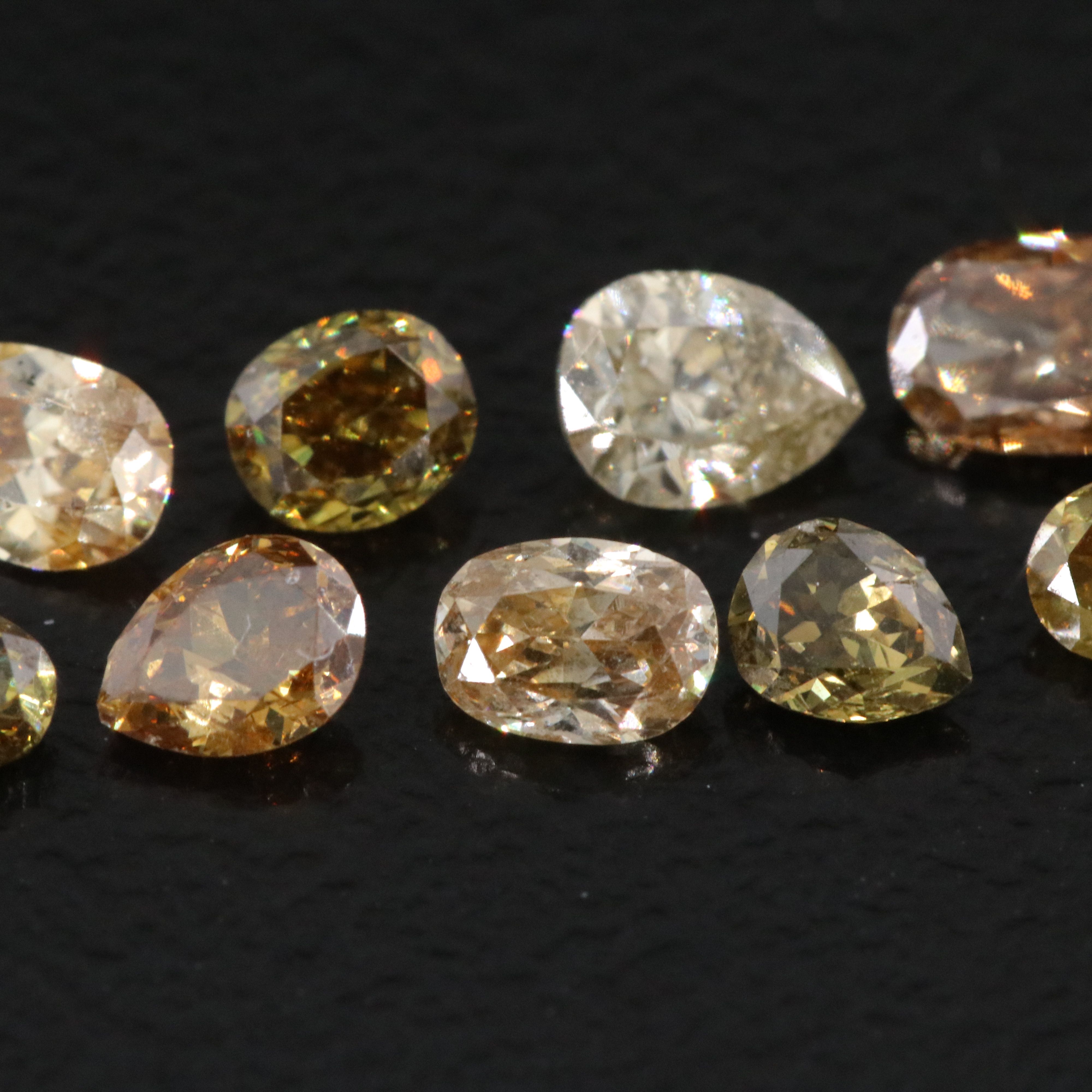 Loose 1.56 CTW Diamond Lot Including Fancy Color
