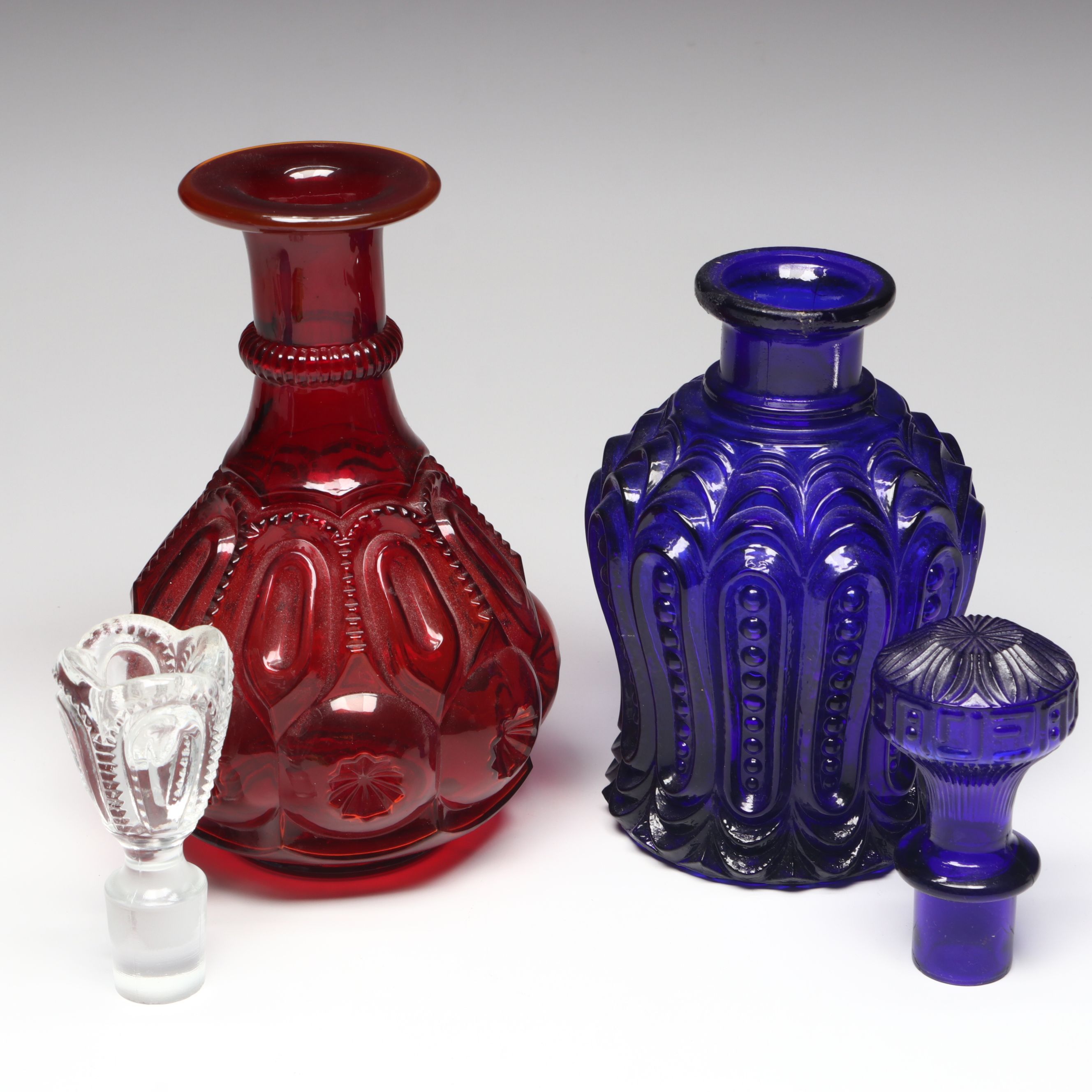 L. G. Wright "Moon and Star Ruby" Glass Decanter with Other Vintage Decanters