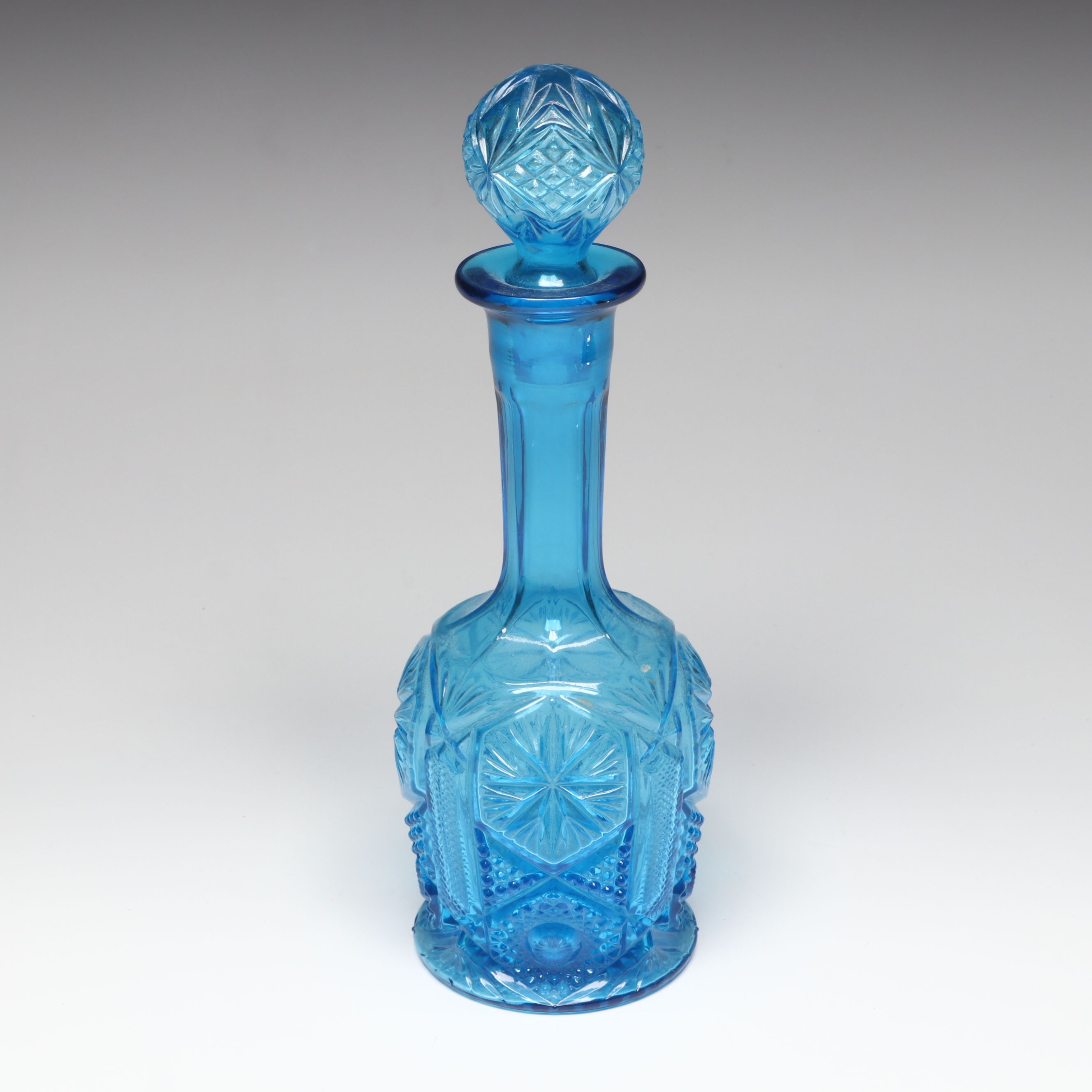 L. G. Wright "Moon and Star Ruby" Glass Decanter with Other Vintage Decanters