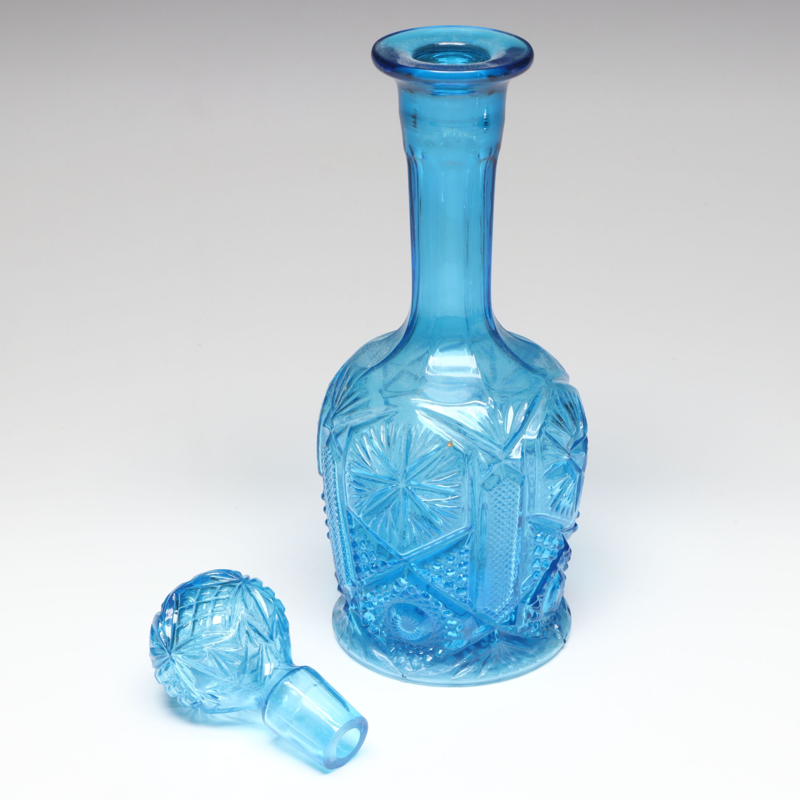 L. G. Wright "Moon and Star Ruby" Glass Decanter with Other Vintage Decanters