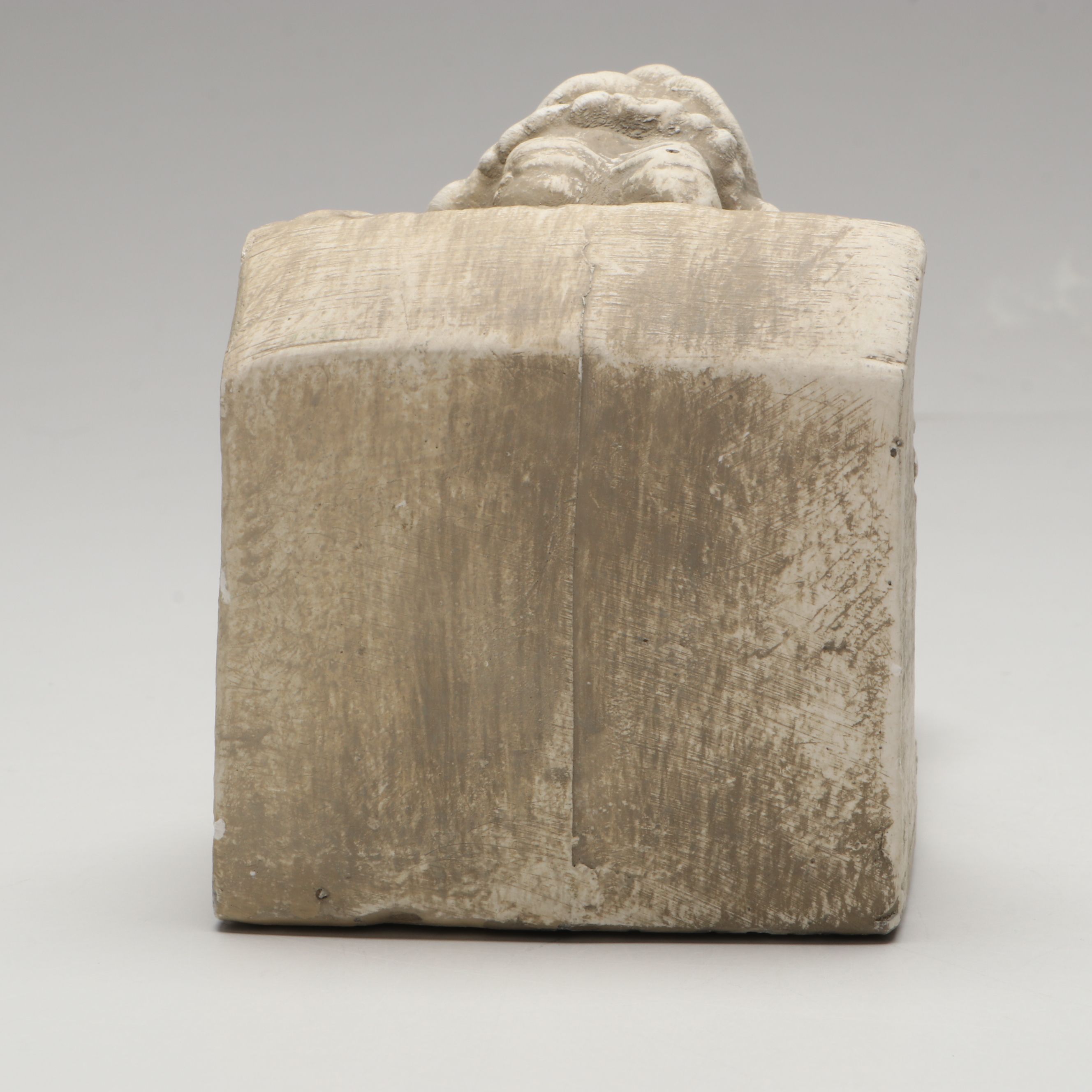 Chalkware Gargoyle and Cast Iron Fleur-de-Lis