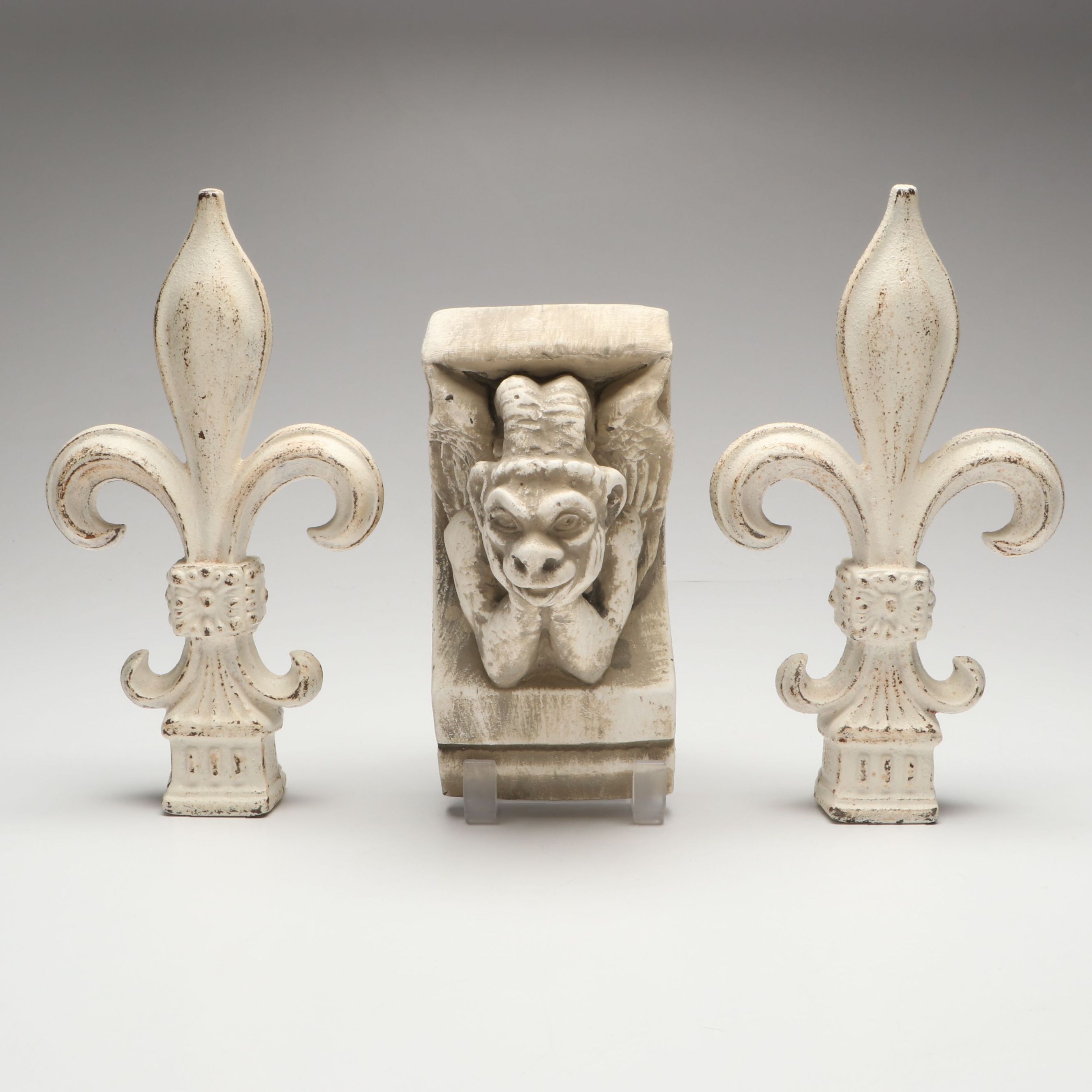 Chalkware Gargoyle and Cast Iron Fleur-de-Lis