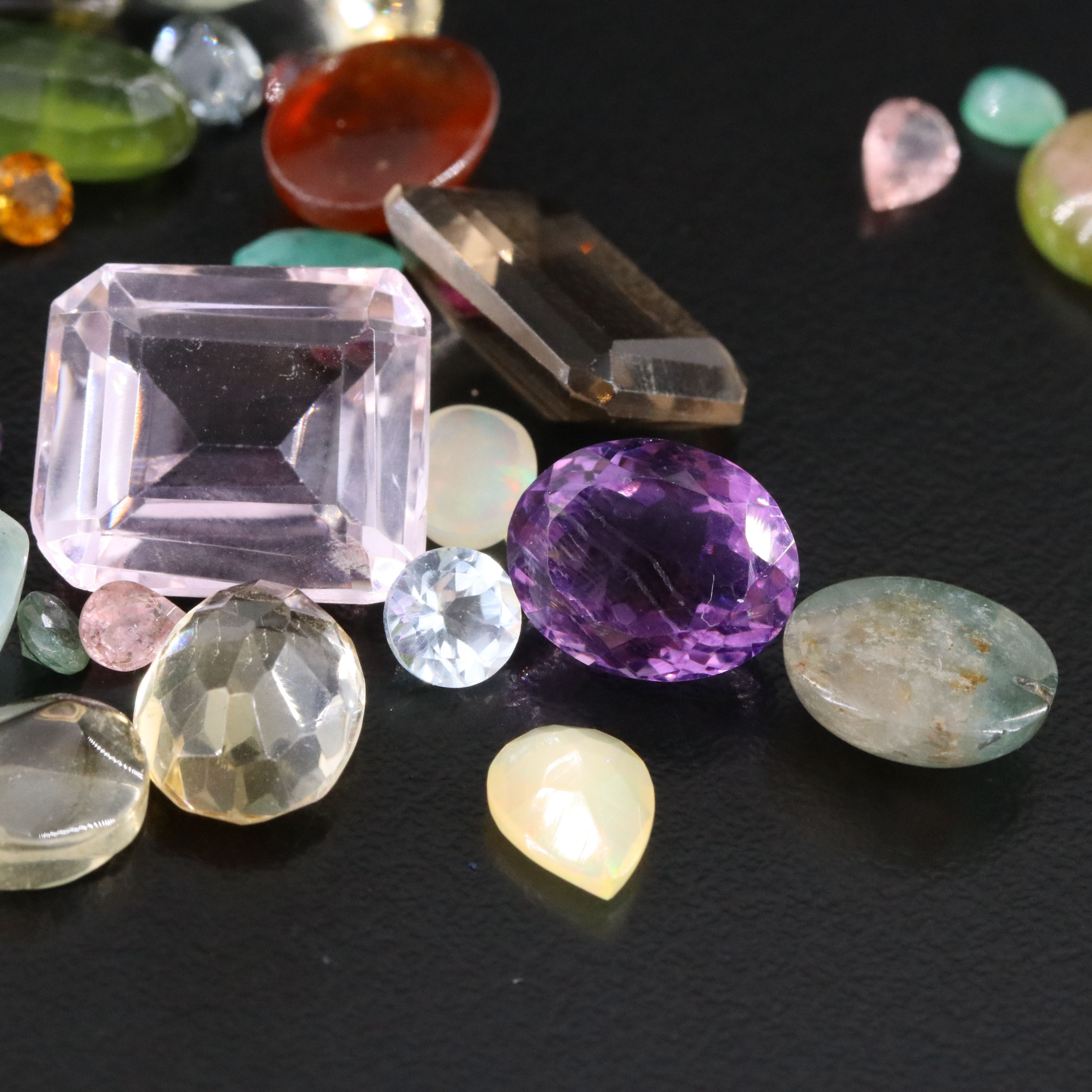 Loose 96.25 CTW Gemstone Lot Including Opal, Amethyst and Peridot