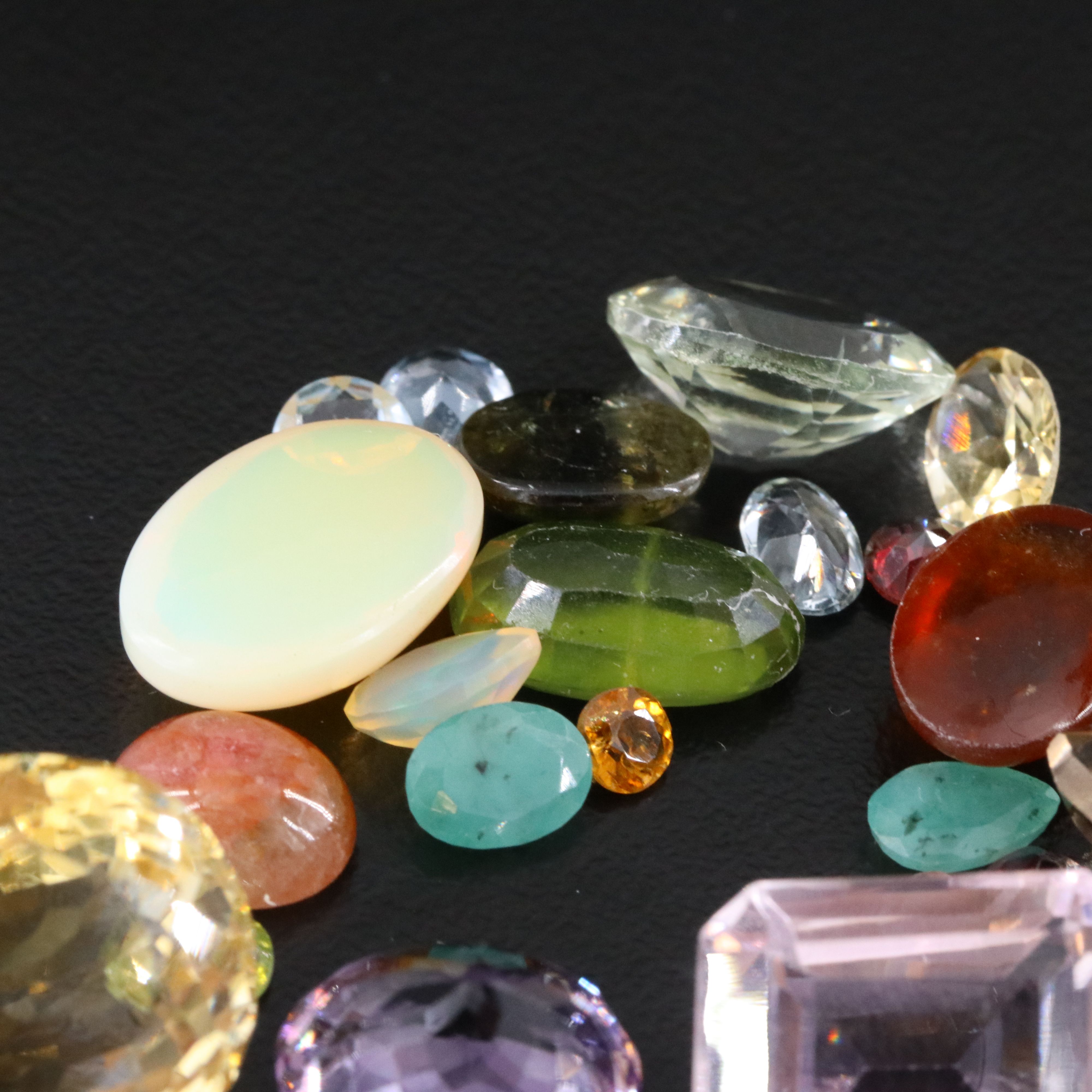 Loose 96.25 CTW Gemstone Lot Including Opal, Amethyst and Peridot