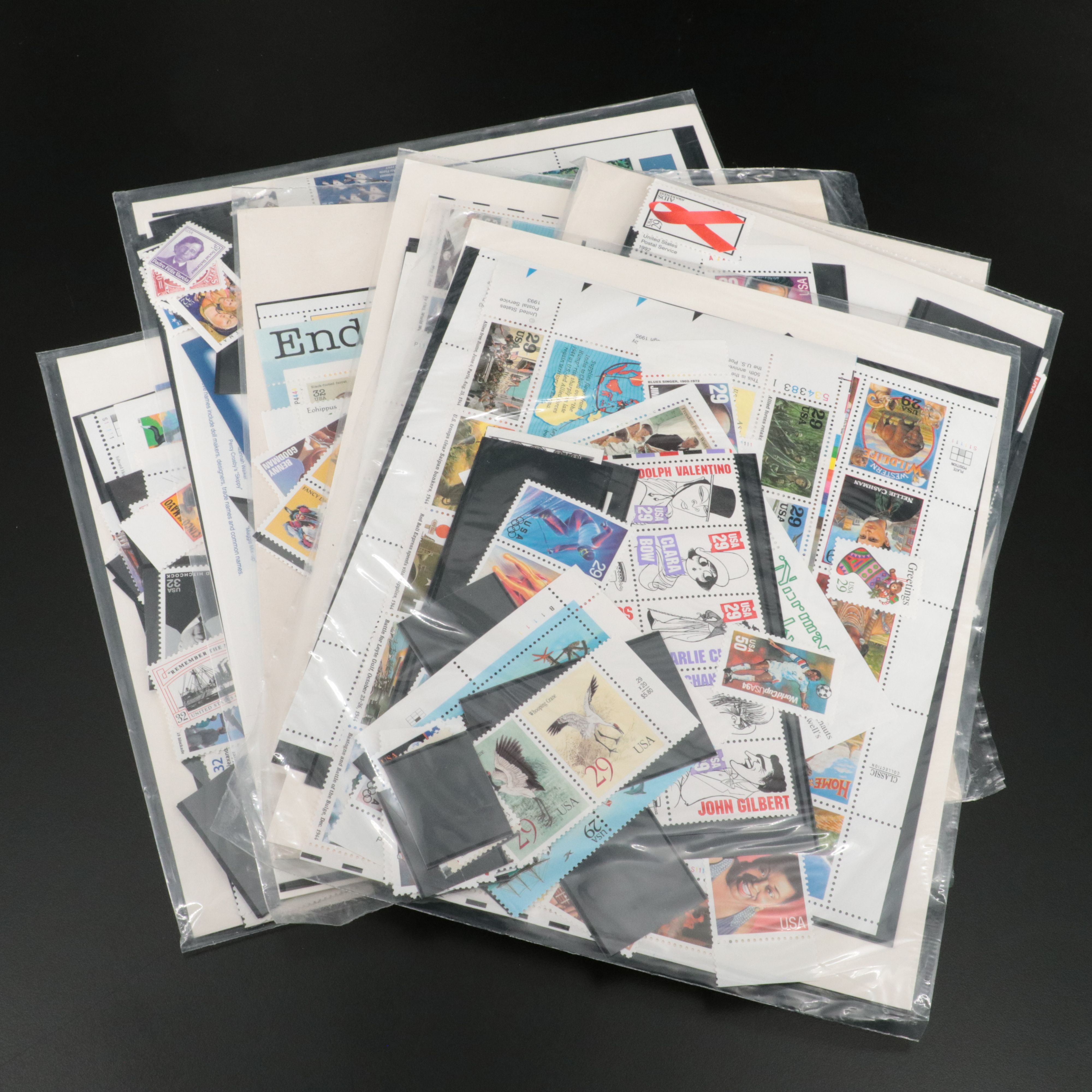 Seven Sets of Mint Condition U.S. Commemorative Postage Stamps, 1990s