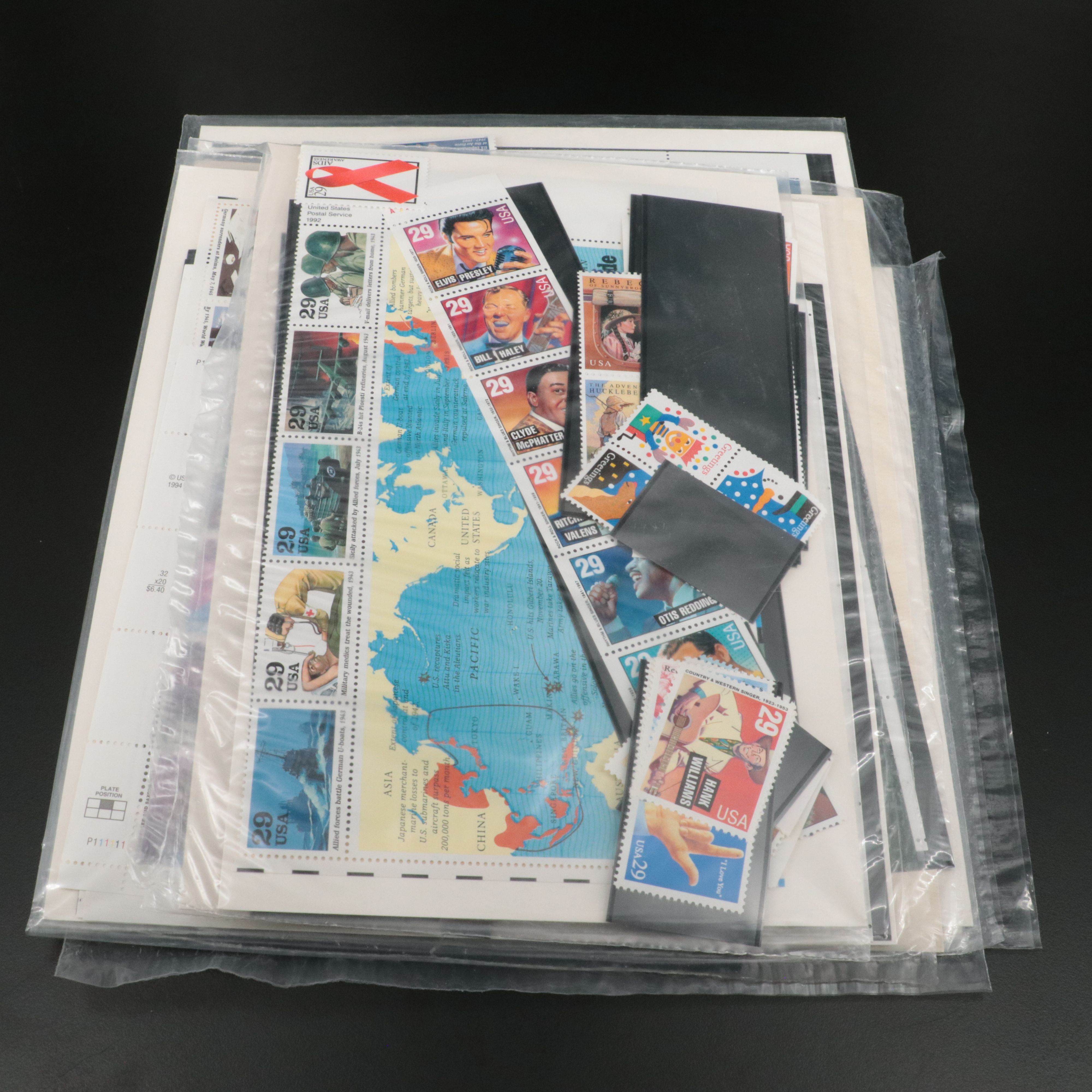 Seven Sets of Mint Condition U.S. Commemorative Postage Stamps, 1990s