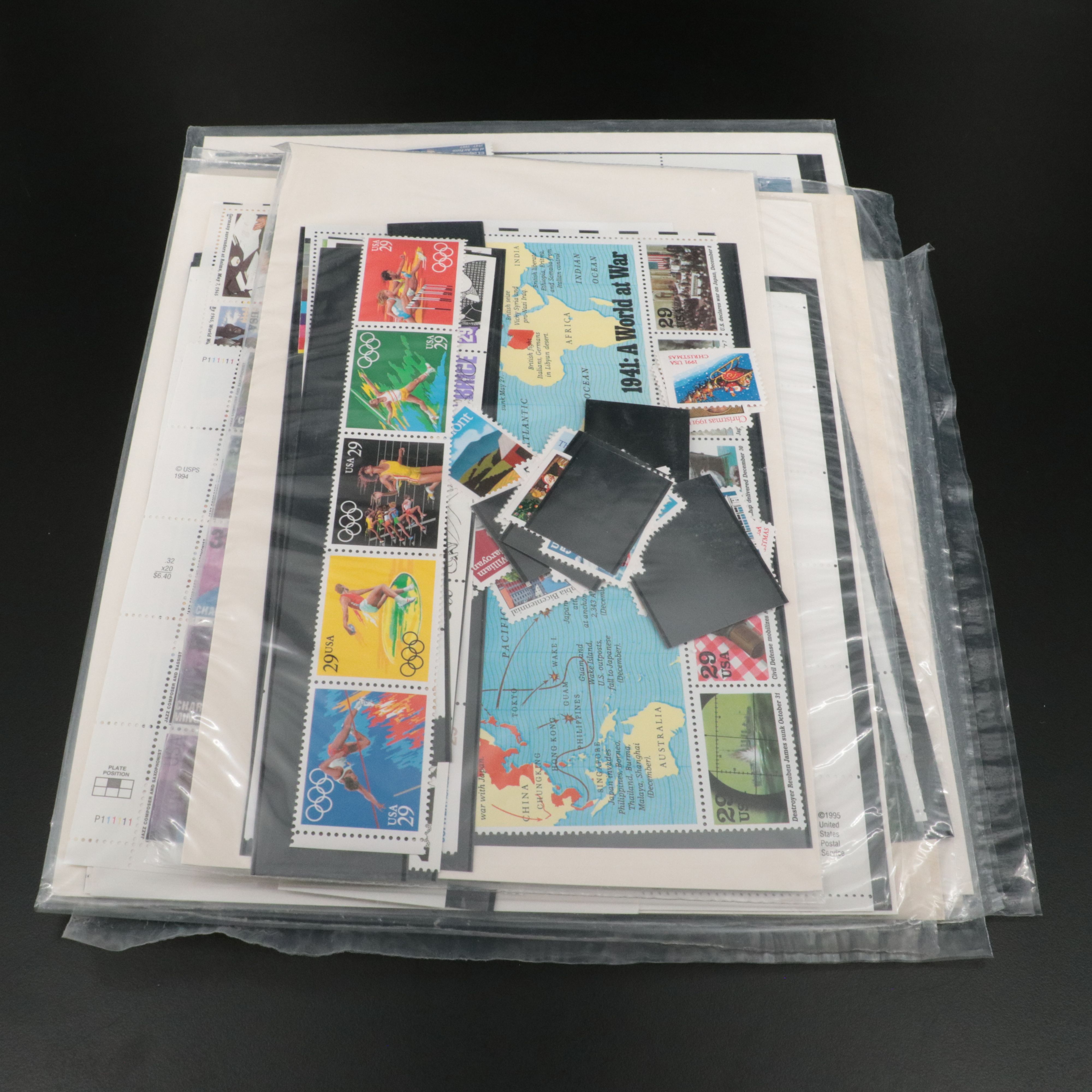 Seven Sets of Mint Condition U.S. Commemorative Postage Stamps, 1990s
