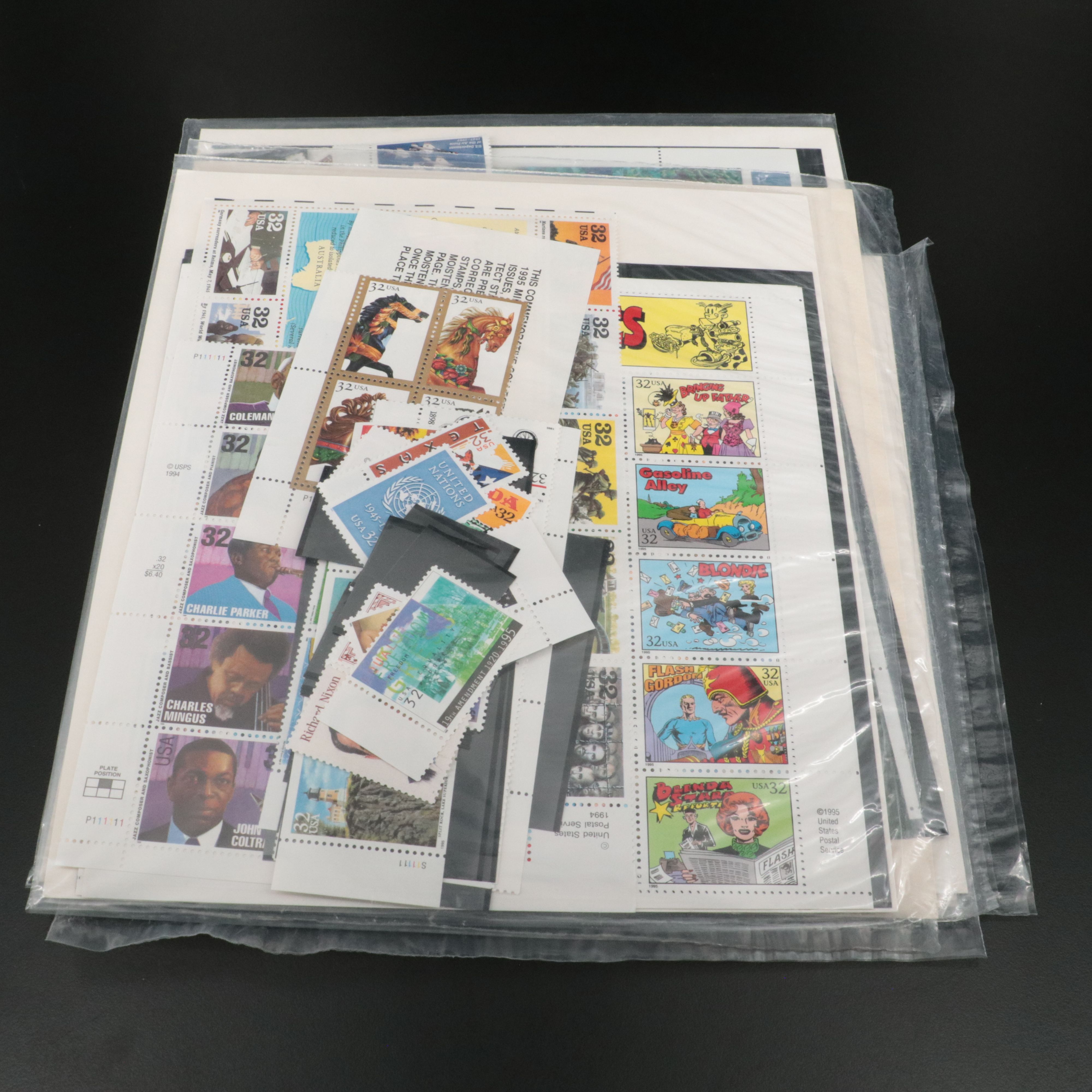 Seven Sets of Mint Condition U.S. Commemorative Postage Stamps, 1990s