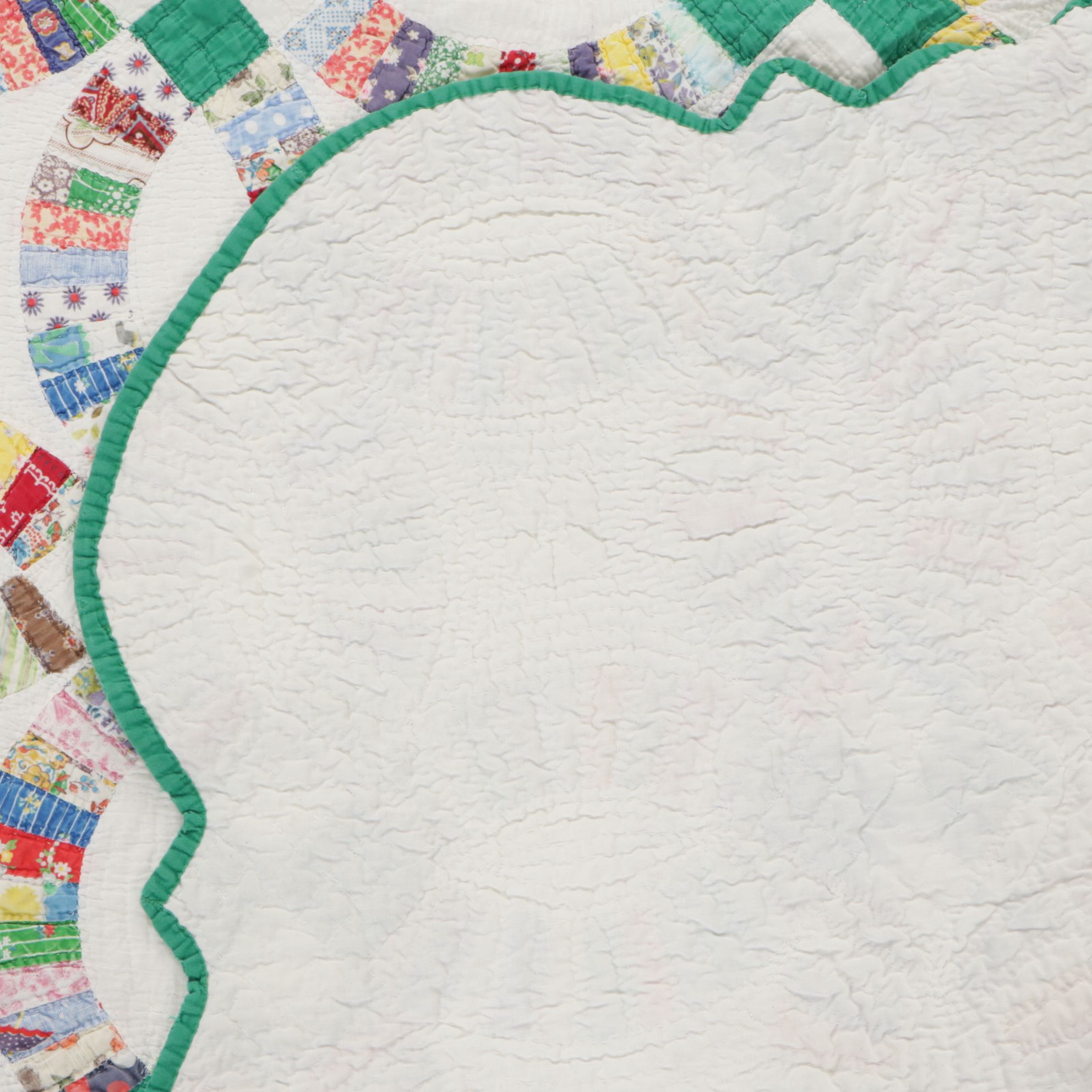 Hand-Pieced Double Wedding Ring Quilt