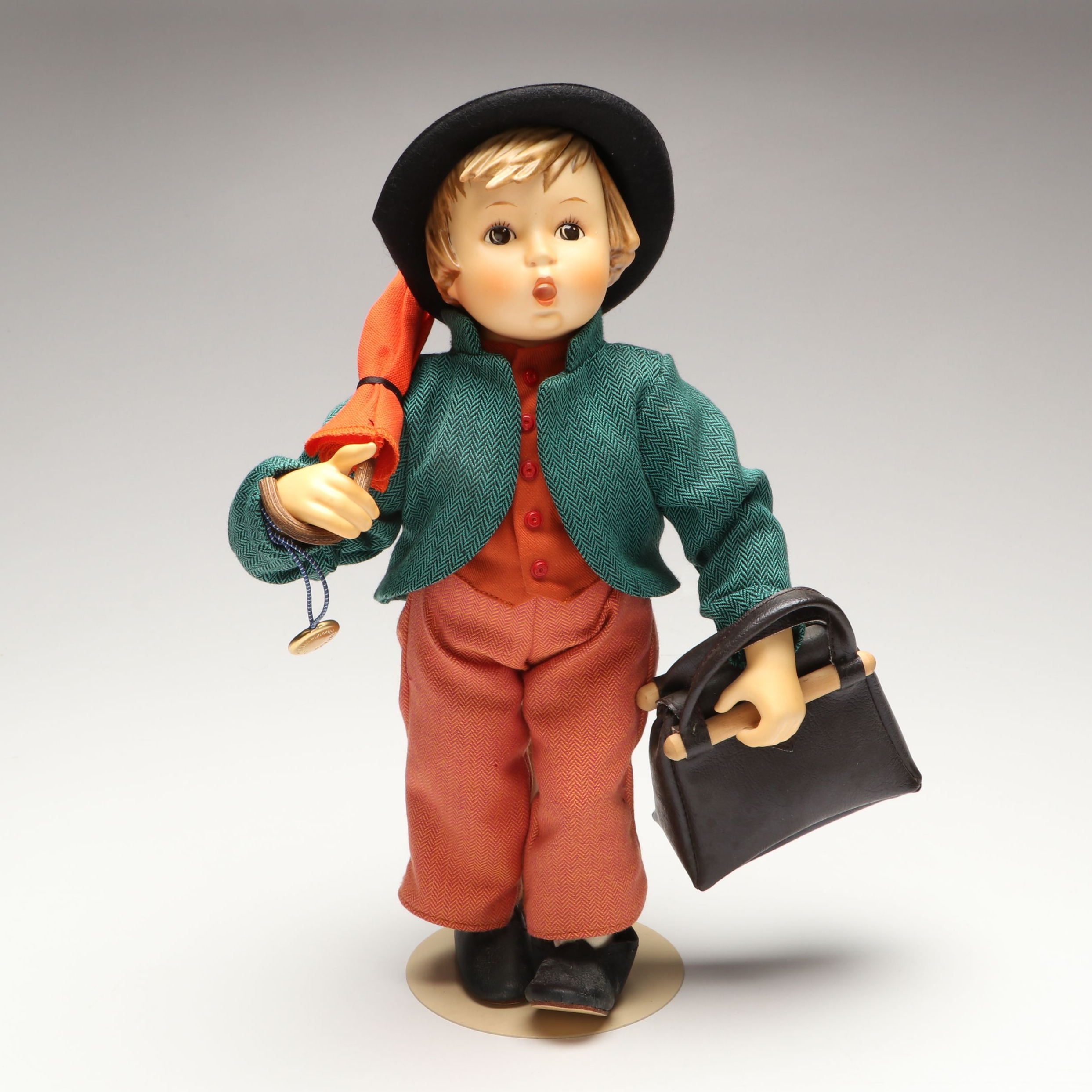 Goebel Hummel "Merry Wanderer" Porcelain Doll with Shelf Sitter, Late 20th C.