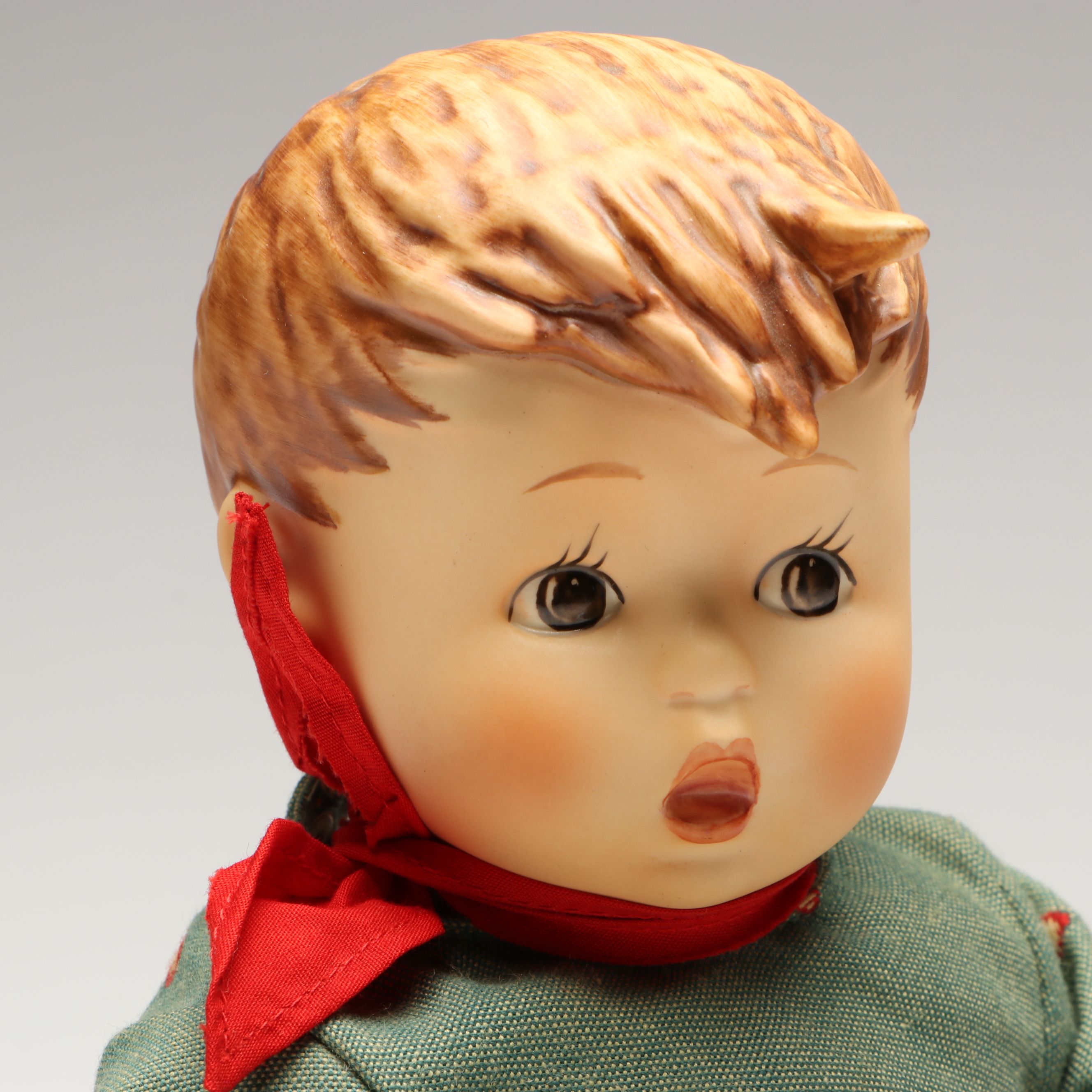 Goebel Hummel "Merry Wanderer" Porcelain Doll with Shelf Sitter, Late 20th C.