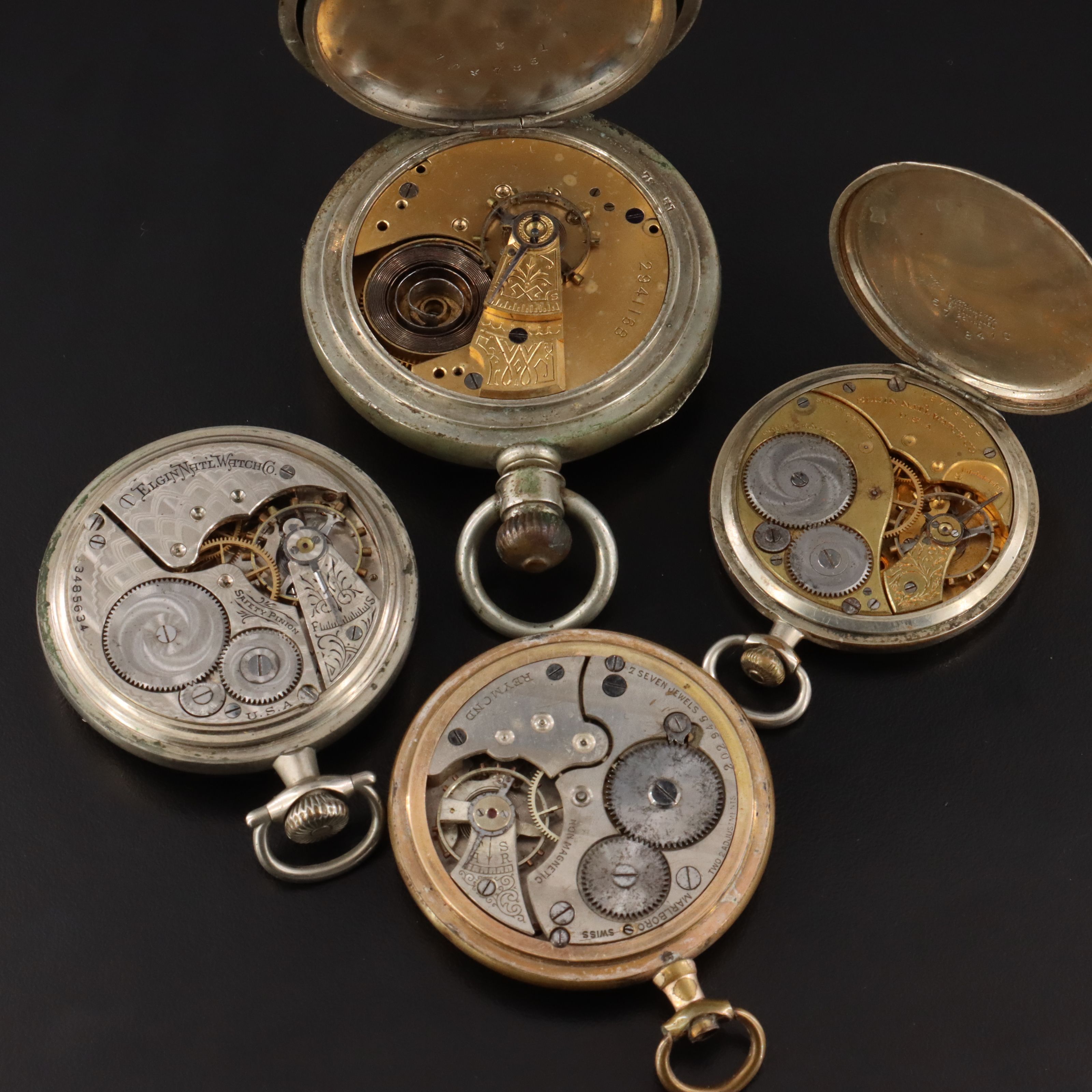 Collection of Vintage and Antique Pocket Watches Featuring Elgin and Westclox