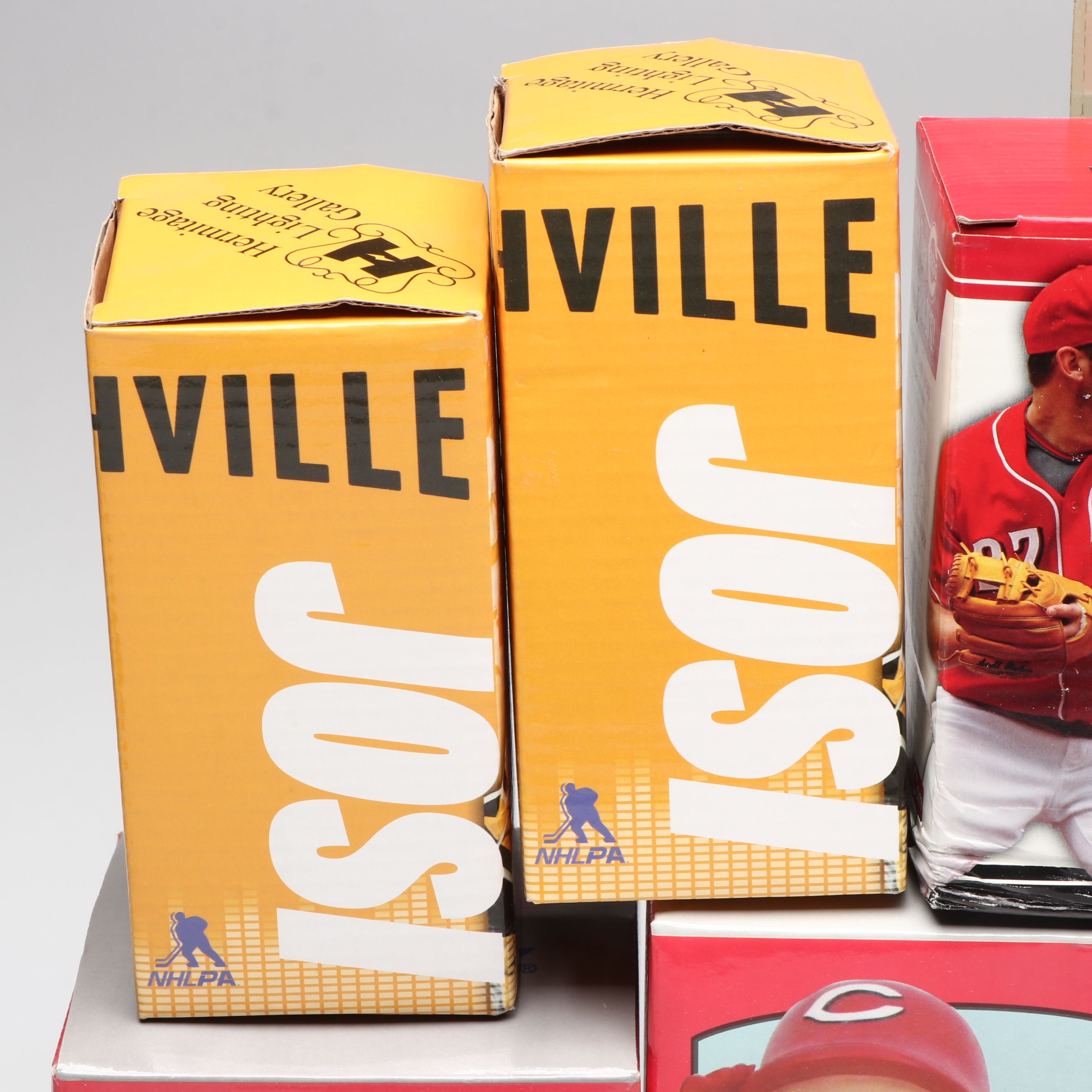 Cincinnati Reds with Other Hockey Bobbleheads and Figurines