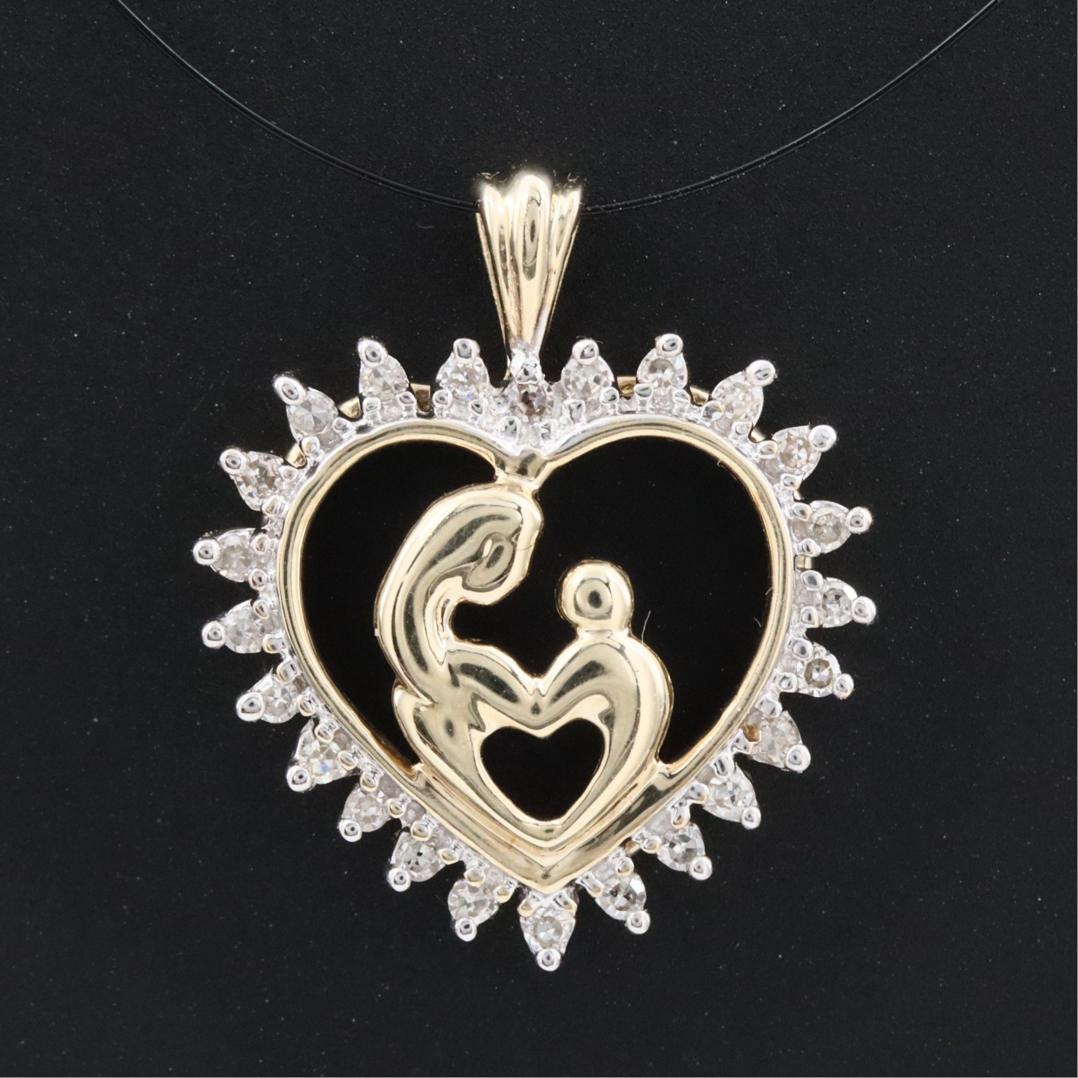 10K 0.15 CTW Diamond Mother and Child Heart Pendant