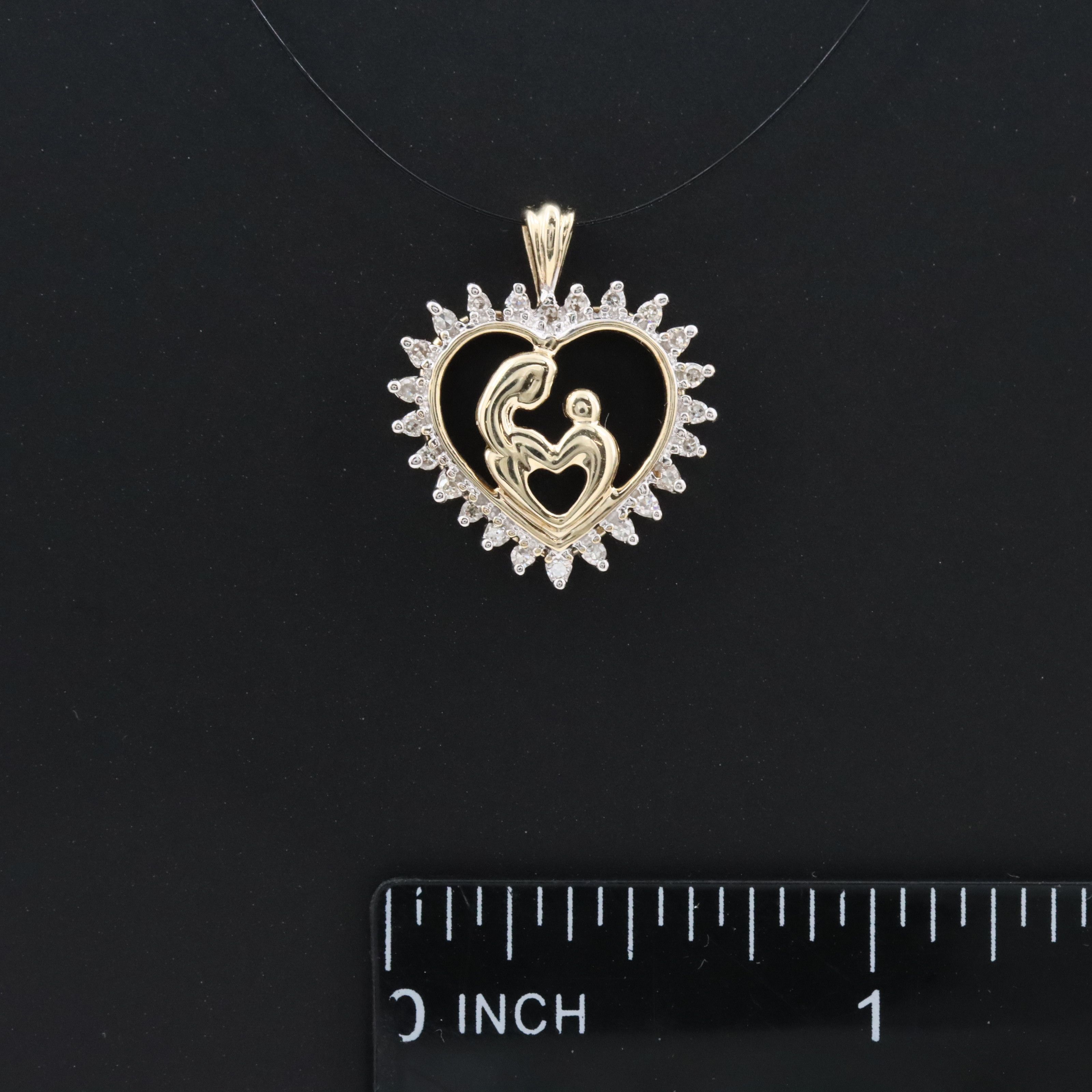 10K 0.15 CTW Diamond Mother and Child Heart Pendant