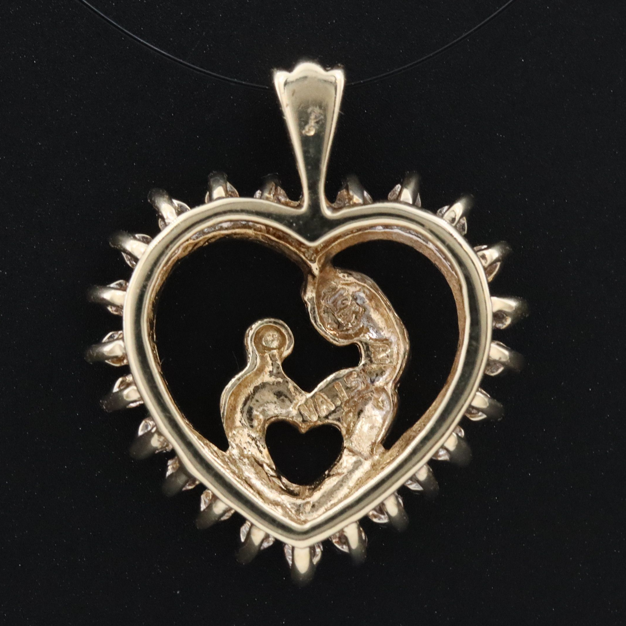 10K 0.15 CTW Diamond Mother and Child Heart Pendant