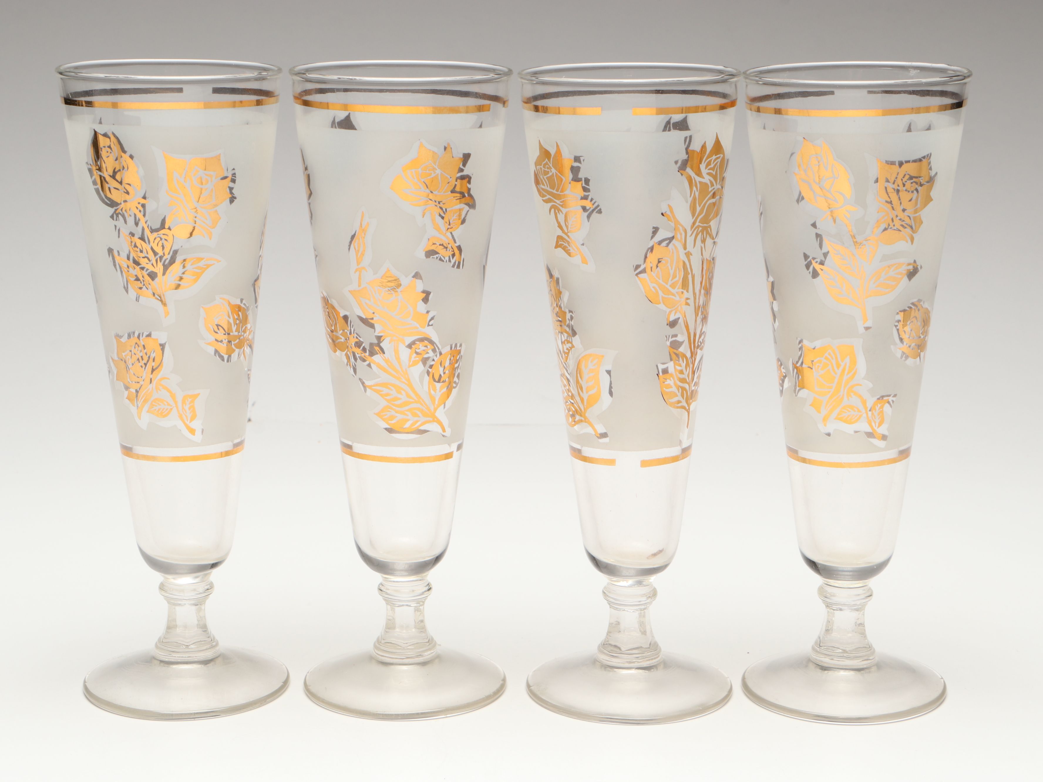 Mid-Century Gold Gilt Rose Glass Cocktail Shaker and Champagne Flutes