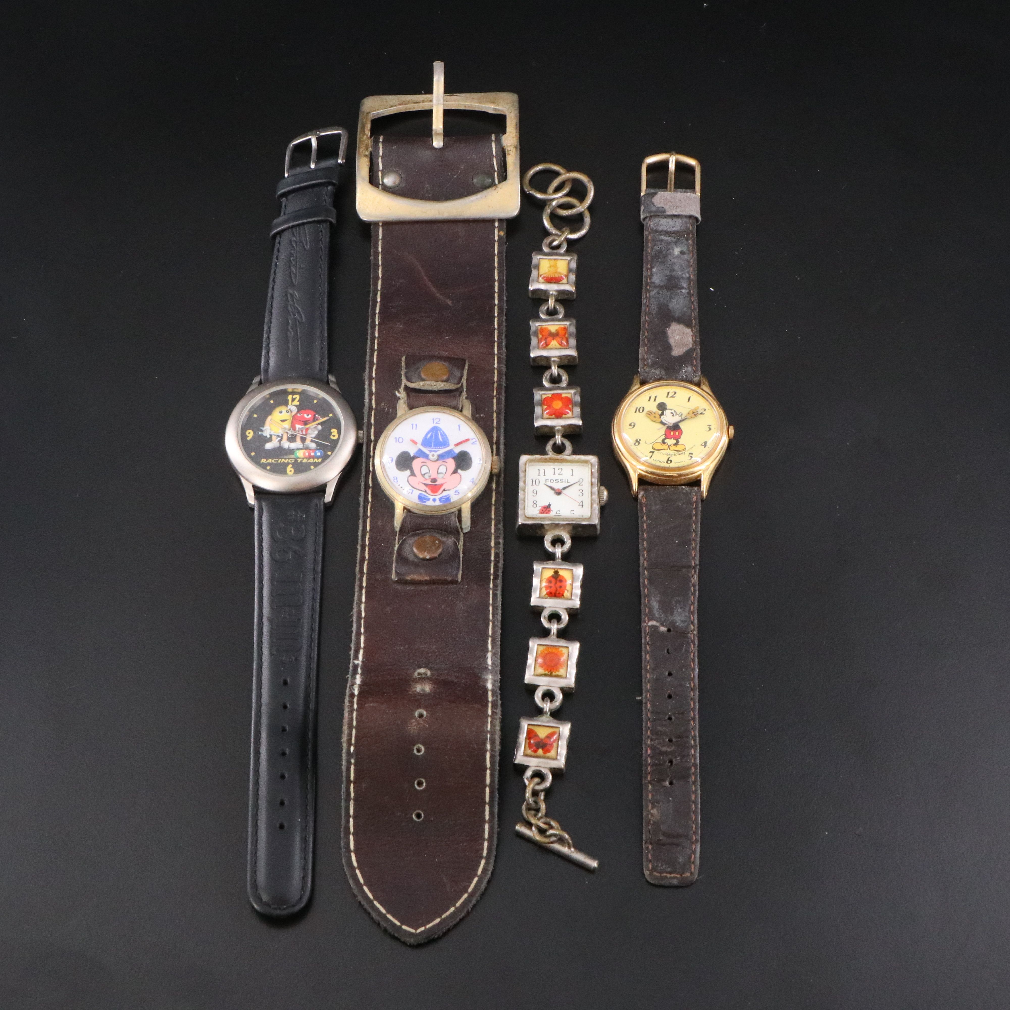 Collection of Fossil and Novelty Mickey Mouse and M & M Watches