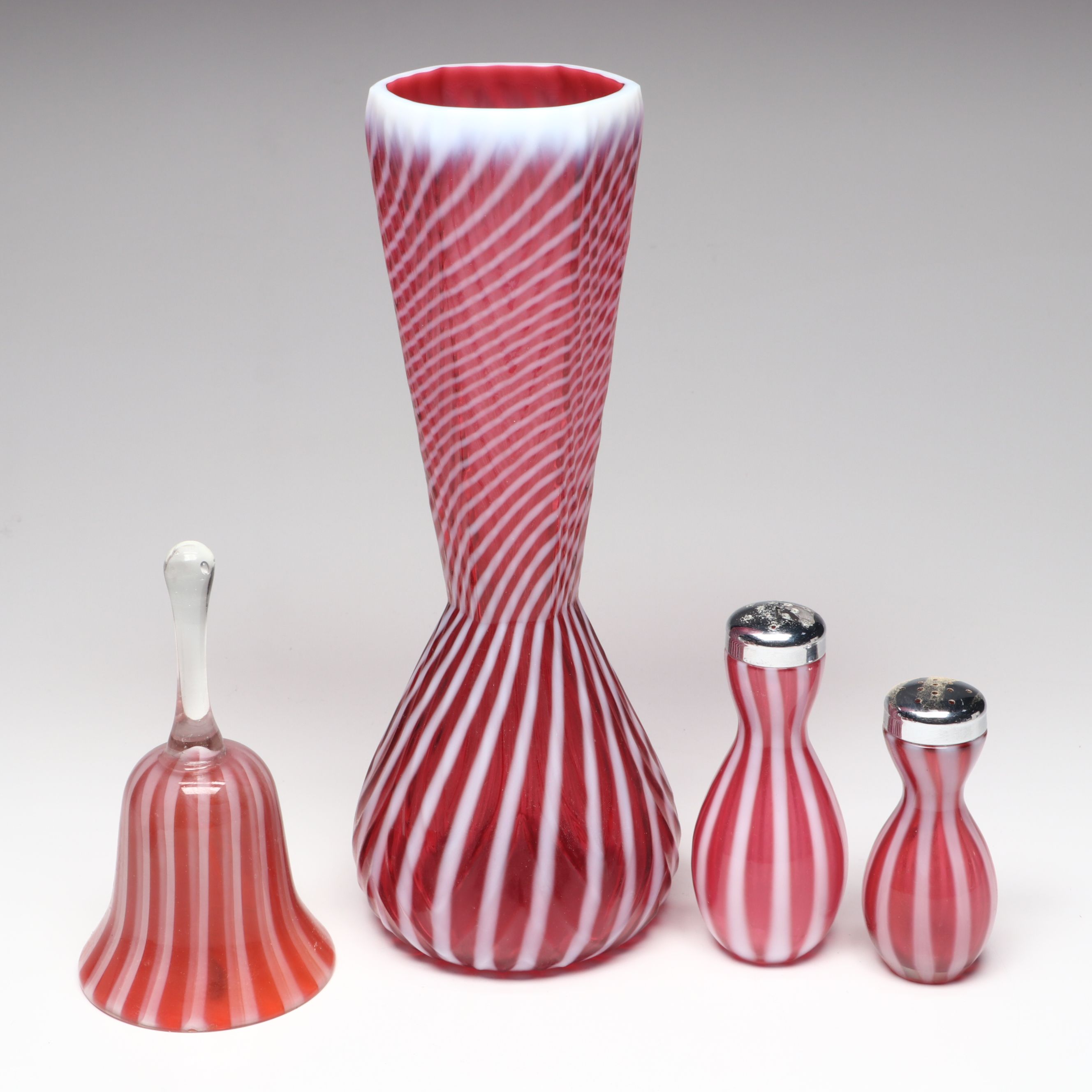 Fenton Cranberry Ribbed Swirl Opalescent Glass Vase, Shakers, and Bell