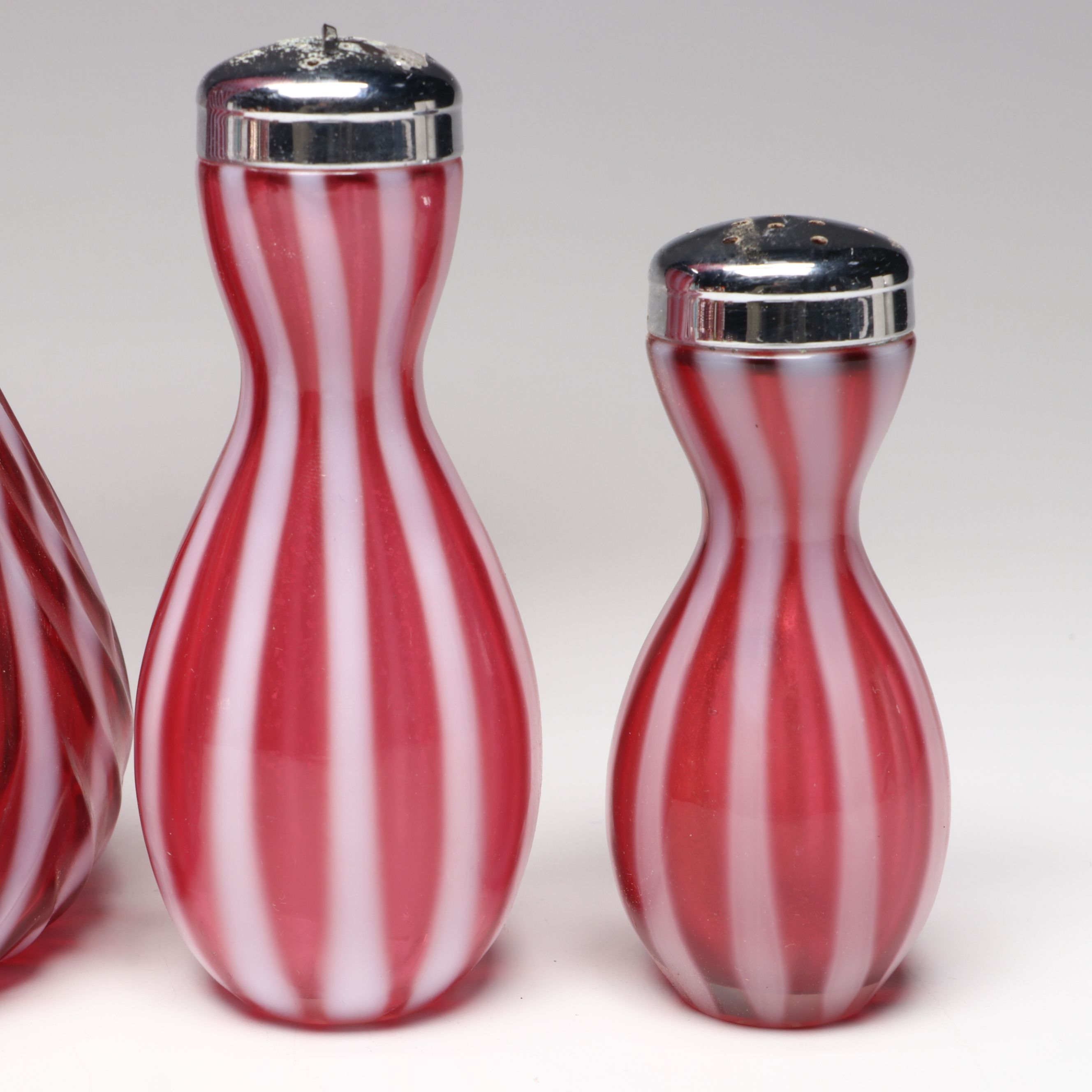 Fenton Cranberry Ribbed Swirl Opalescent Glass Vase, Shakers, and Bell