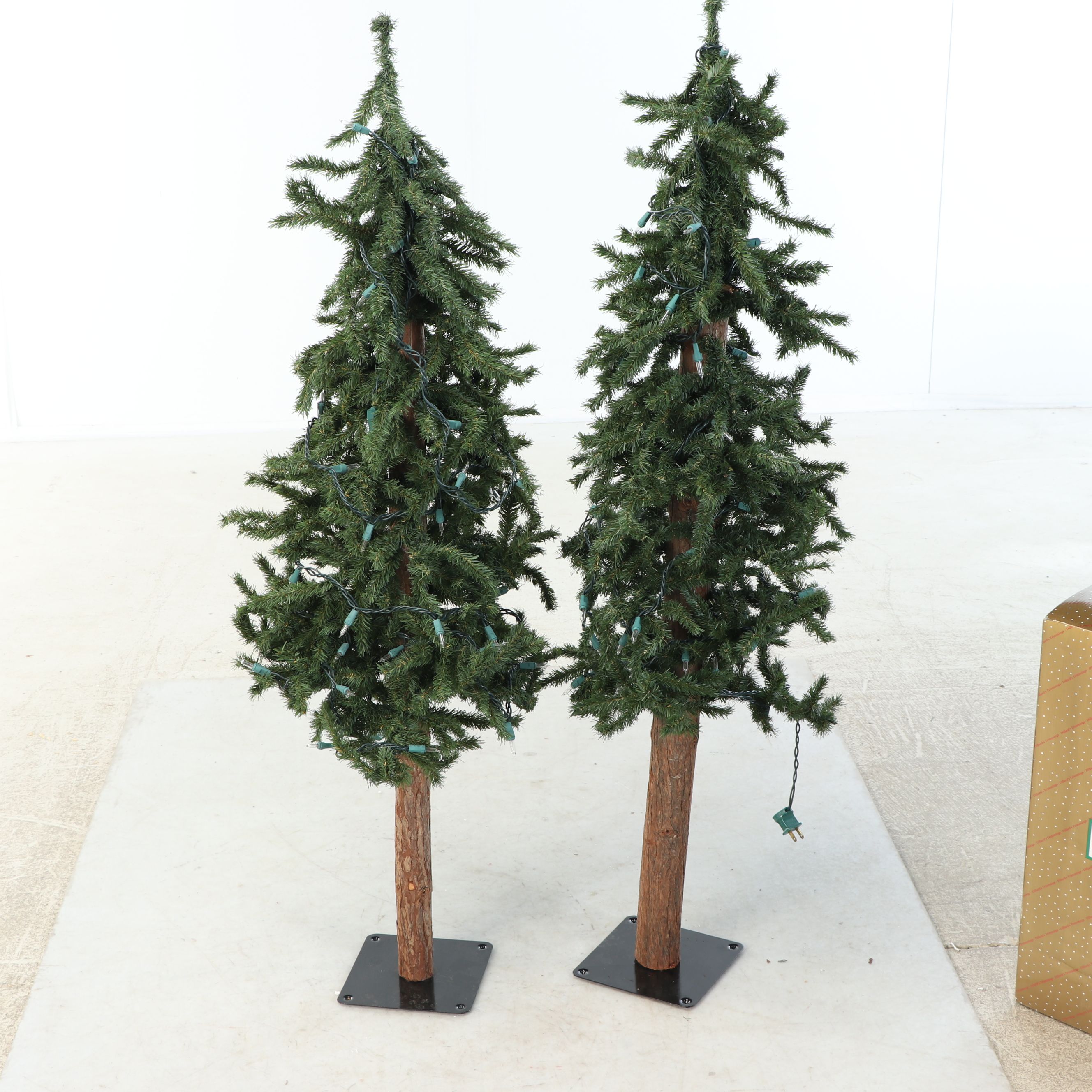 Standing Artificial Pine Trees, Colorful Glass Ornaments and More Holiday Décor